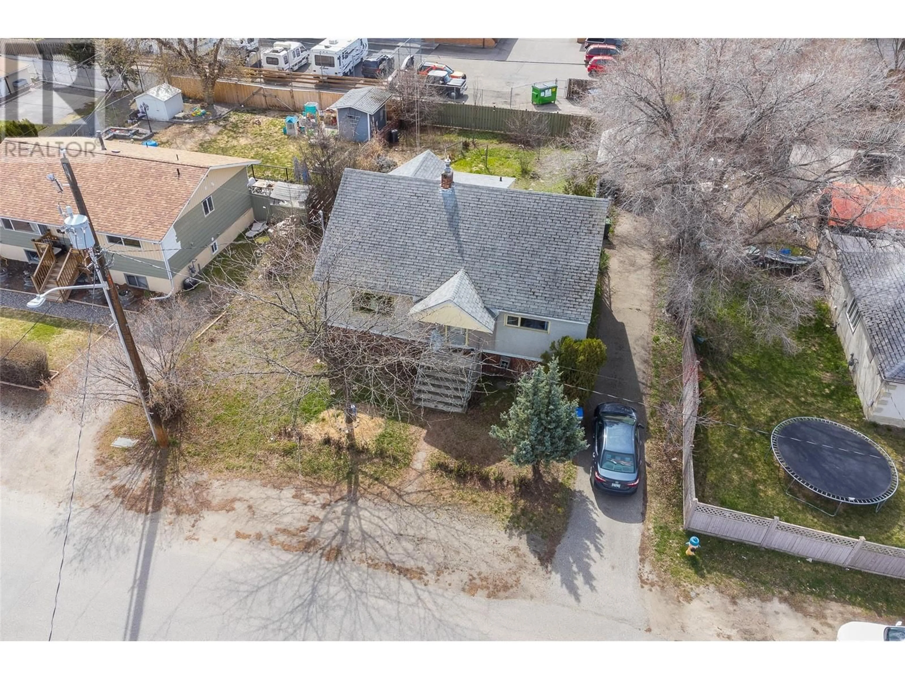 A pic from outside/outdoor area/front of a property/back of a property/a pic from drone, street for 245 Ponto Road, Kelowna British Columbia V1X2G2