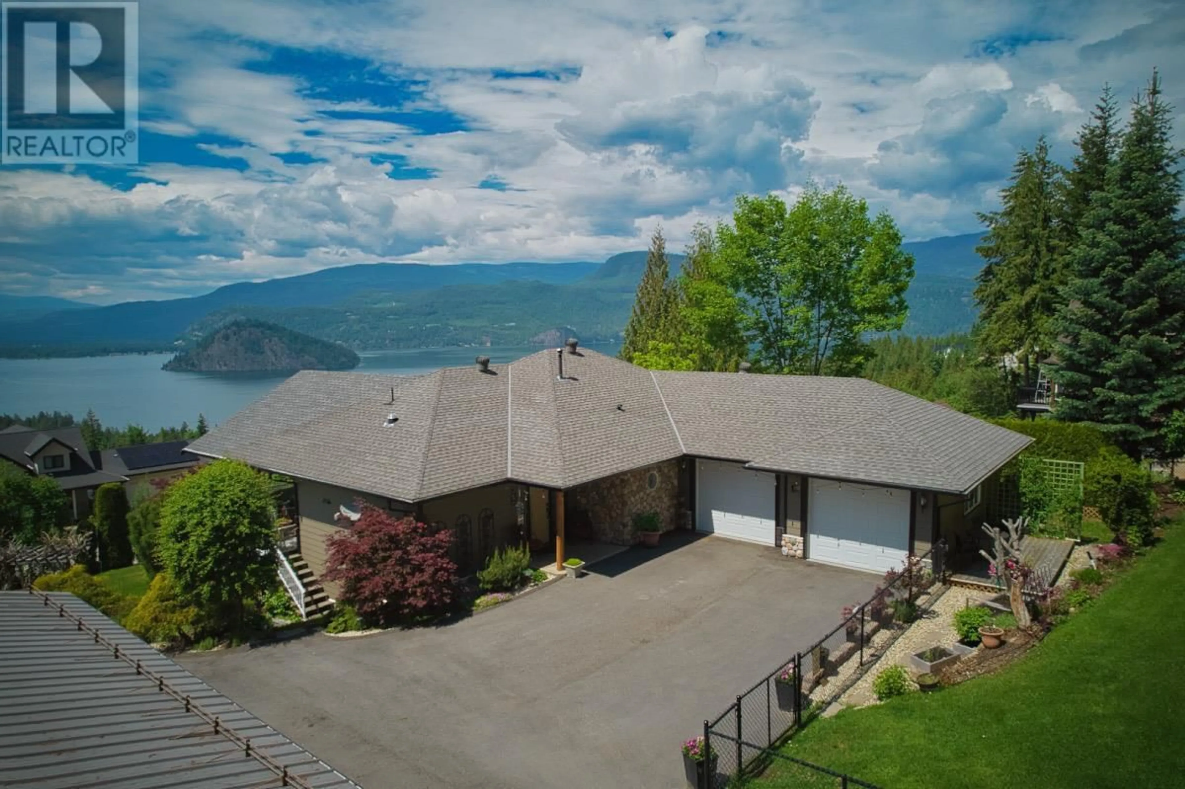 A pic from outside/outdoor area/front of a property/back of a property/a pic from drone, water/lake/river/ocean view for 3320 Roncastle Road, Blind Bay British Columbia V0E1H1