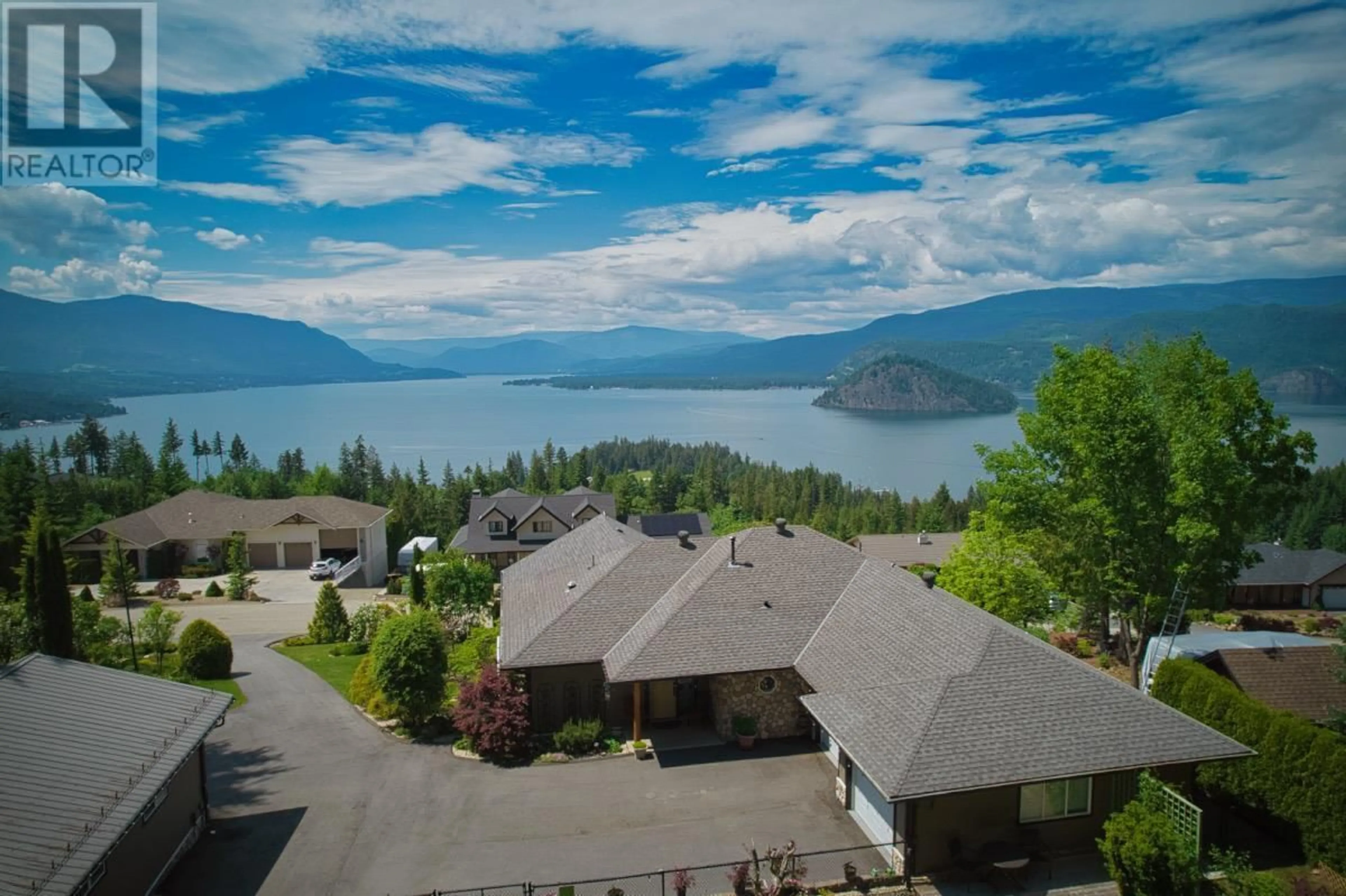 A pic from outside/outdoor area/front of a property/back of a property/a pic from drone, water/lake/river/ocean view for 3320 Roncastle Road, Blind Bay British Columbia V0E1H1