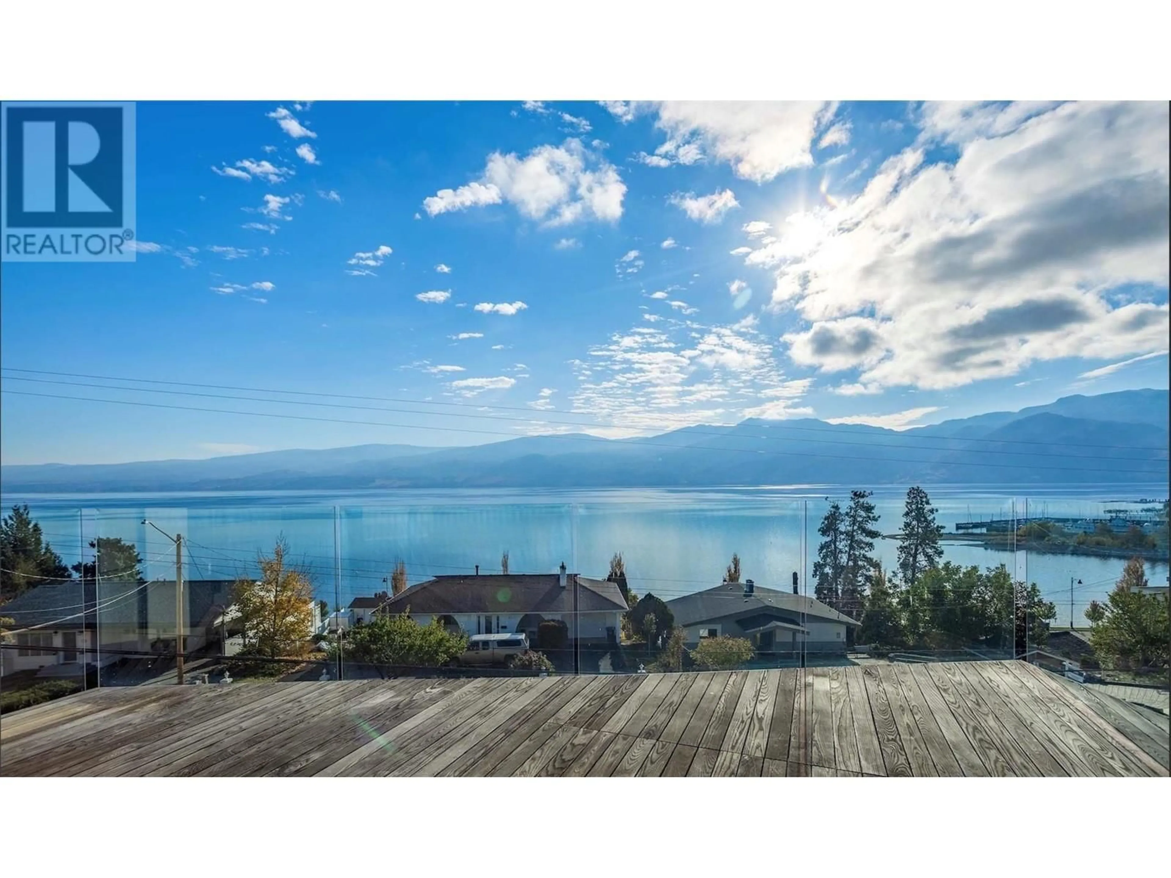A pic from outside/outdoor area/front of a property/back of a property/a pic from drone, water/lake/river/ocean view for 3985 BEACHVIEW DRIVE, West Kelowna British Columbia V4T2K1