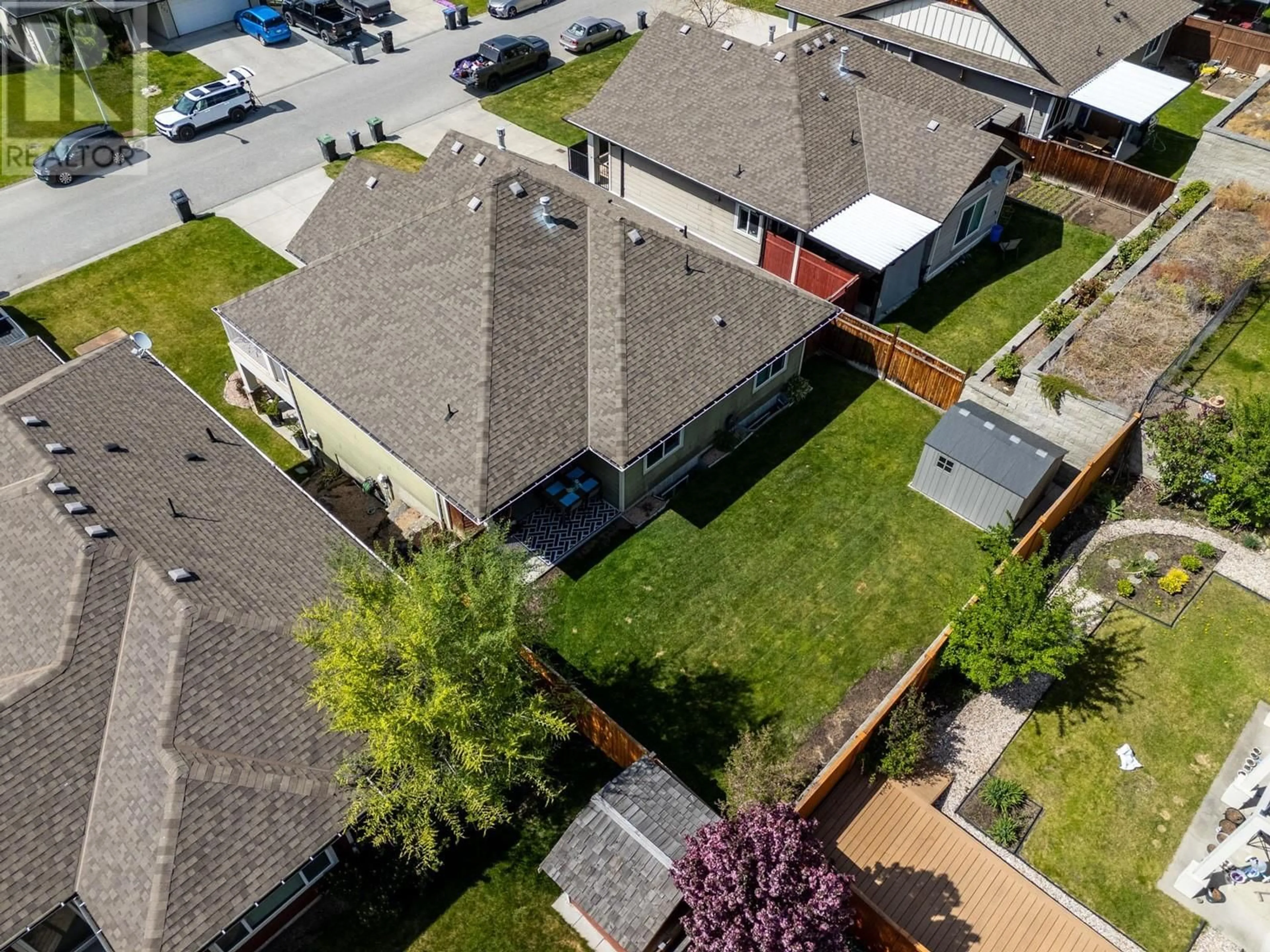 A pic from outside/outdoor area/front of a property/back of a property/a pic from drone, street for 311 POONIAN STREET, Kelowna British Columbia V1X8C3