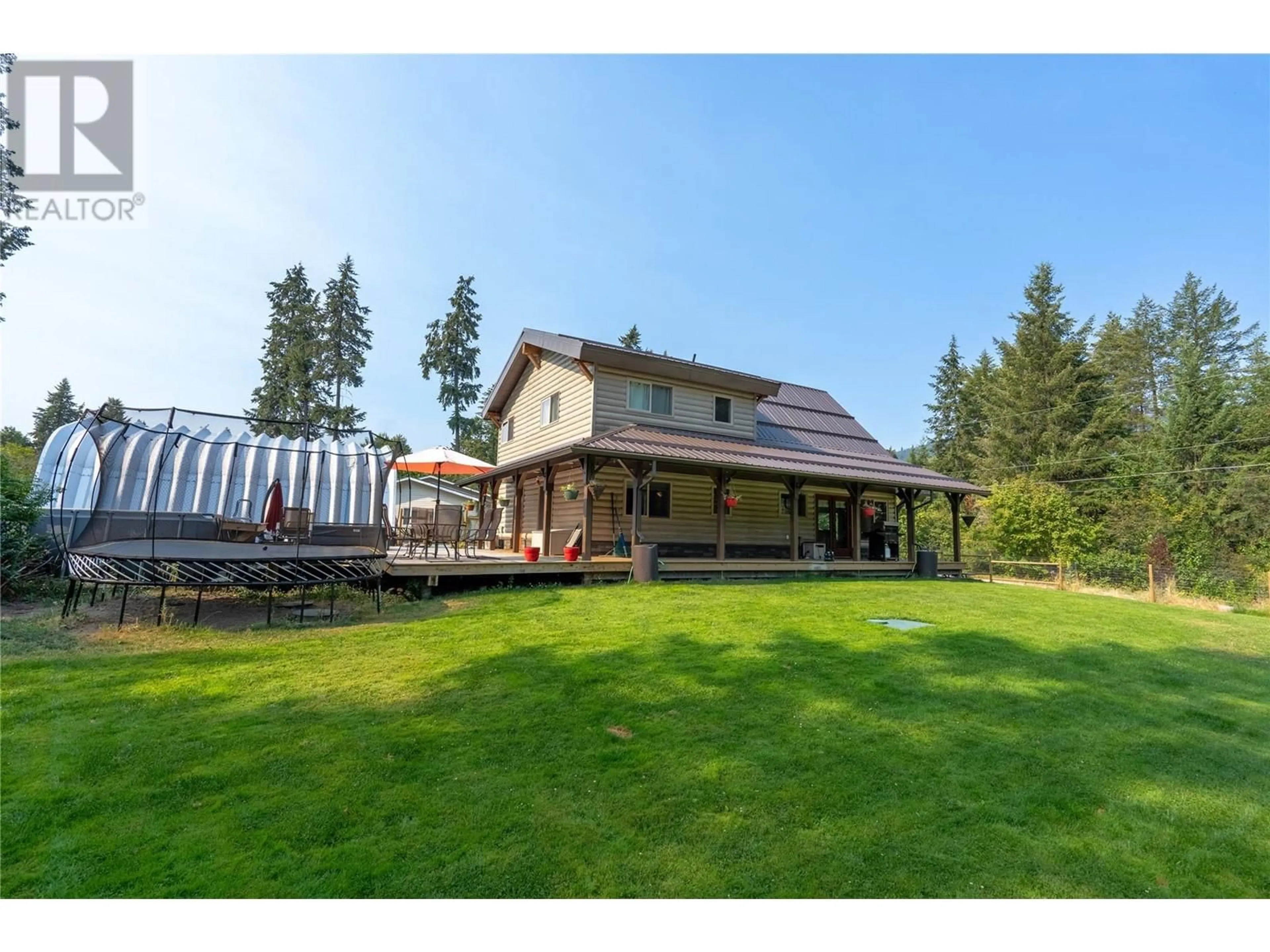 A pic from outside/outdoor area/front of a property/back of a property/a pic from drone, water/lake/river/ocean view for 2111 DUNN ROAD, Christina Lake British Columbia V0H1E2