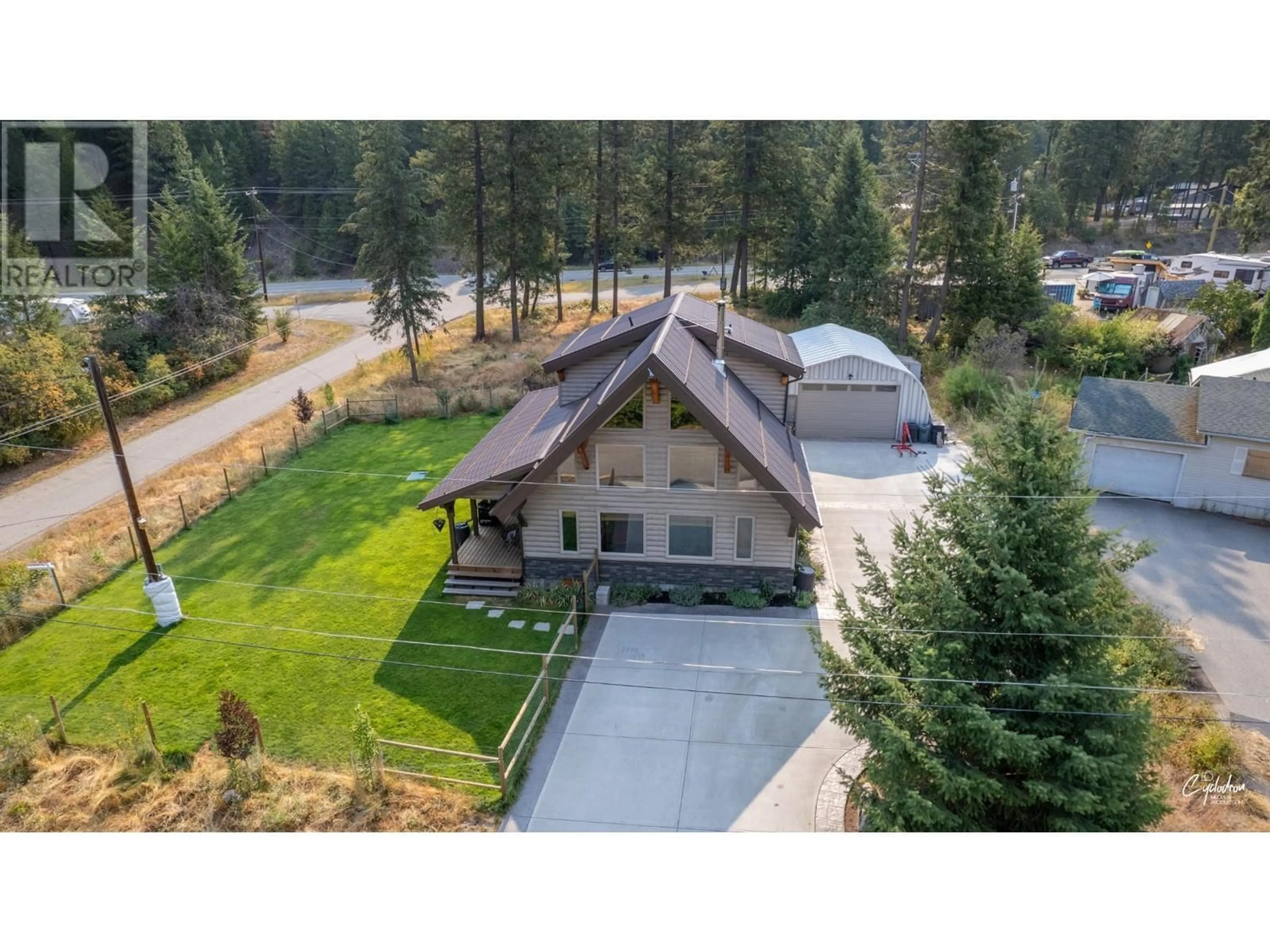 A pic from outside/outdoor area/front of a property/back of a property/a pic from drone, mountain view for 2111 DUNN Road, Christina Lake British Columbia V0H1E2