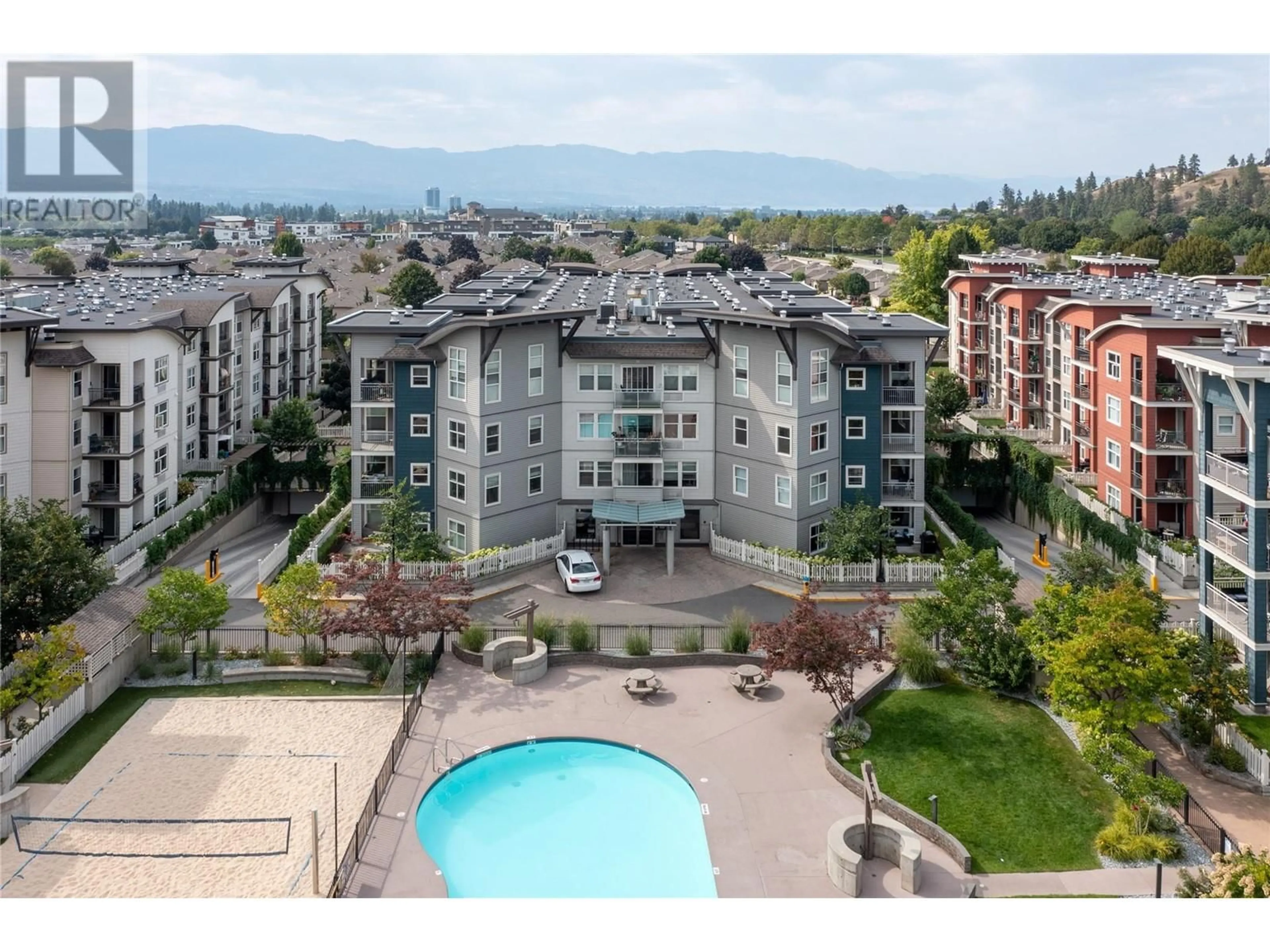 A pic from outside/outdoor area/front of a property/back of a property/a pic from drone, unknown for 563 Yates Road Unit# 302, Kelowna British Columbia V1V2V3