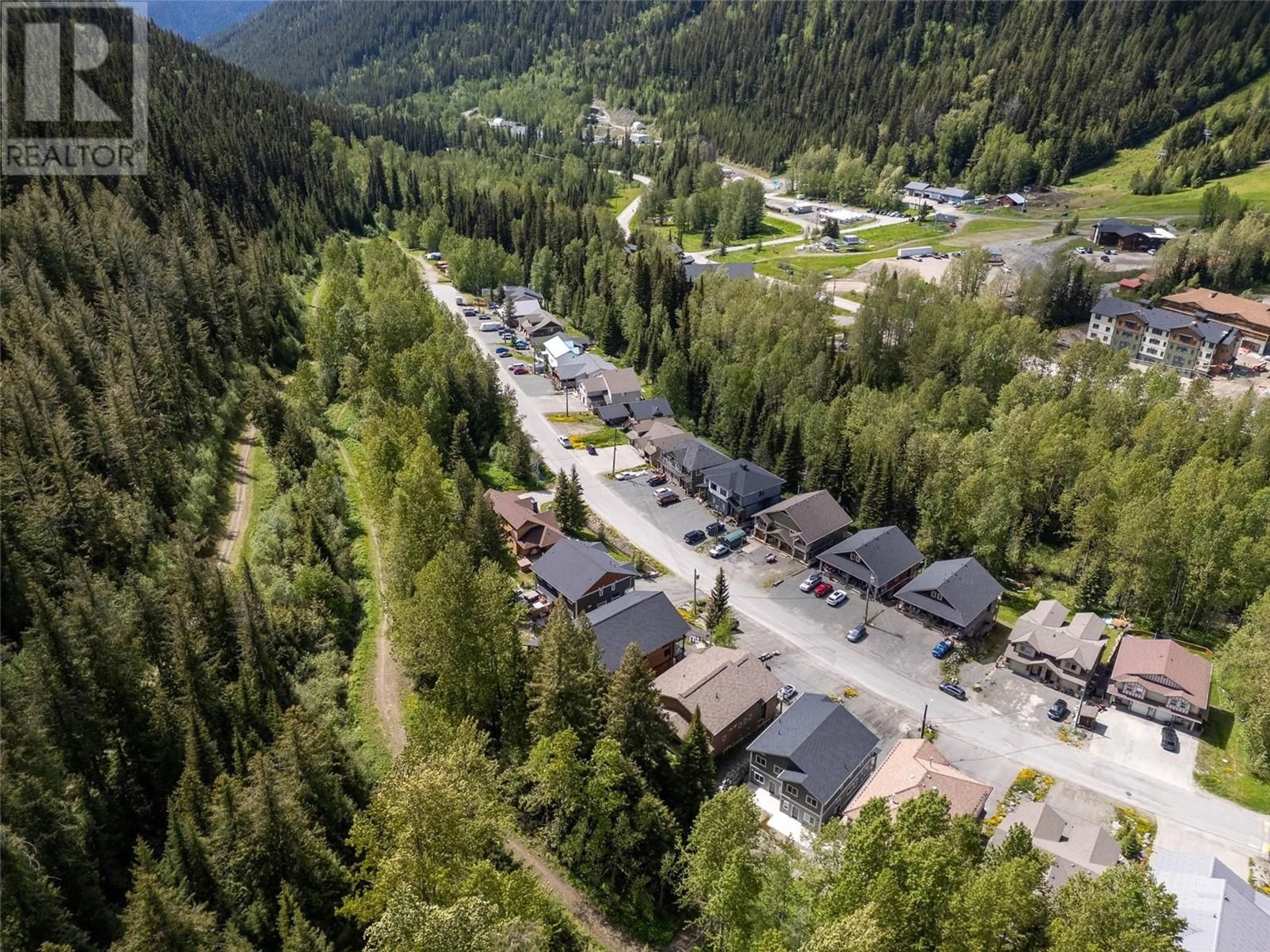 A pic from outside/outdoor area/front of a property/back of a property/a pic from drone, mountain view for 1365 BURFIELD Drive, Sun Peaks British Columbia V0E5N0