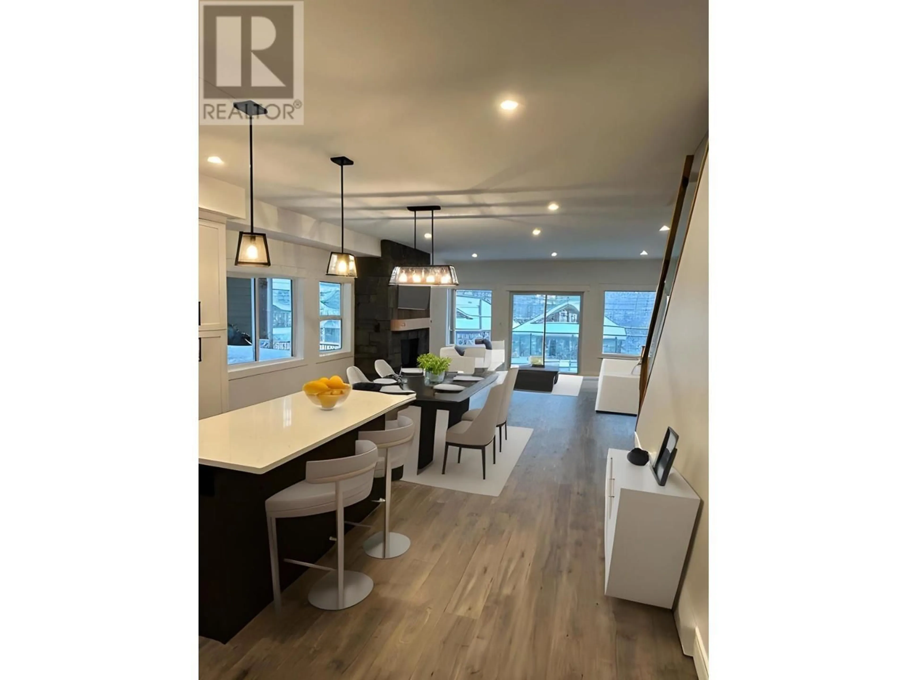 Open concept kitchen, wood/laminate floor for 1367 BURFIELD Drive, Sun Peaks British Columbia V0E5N0