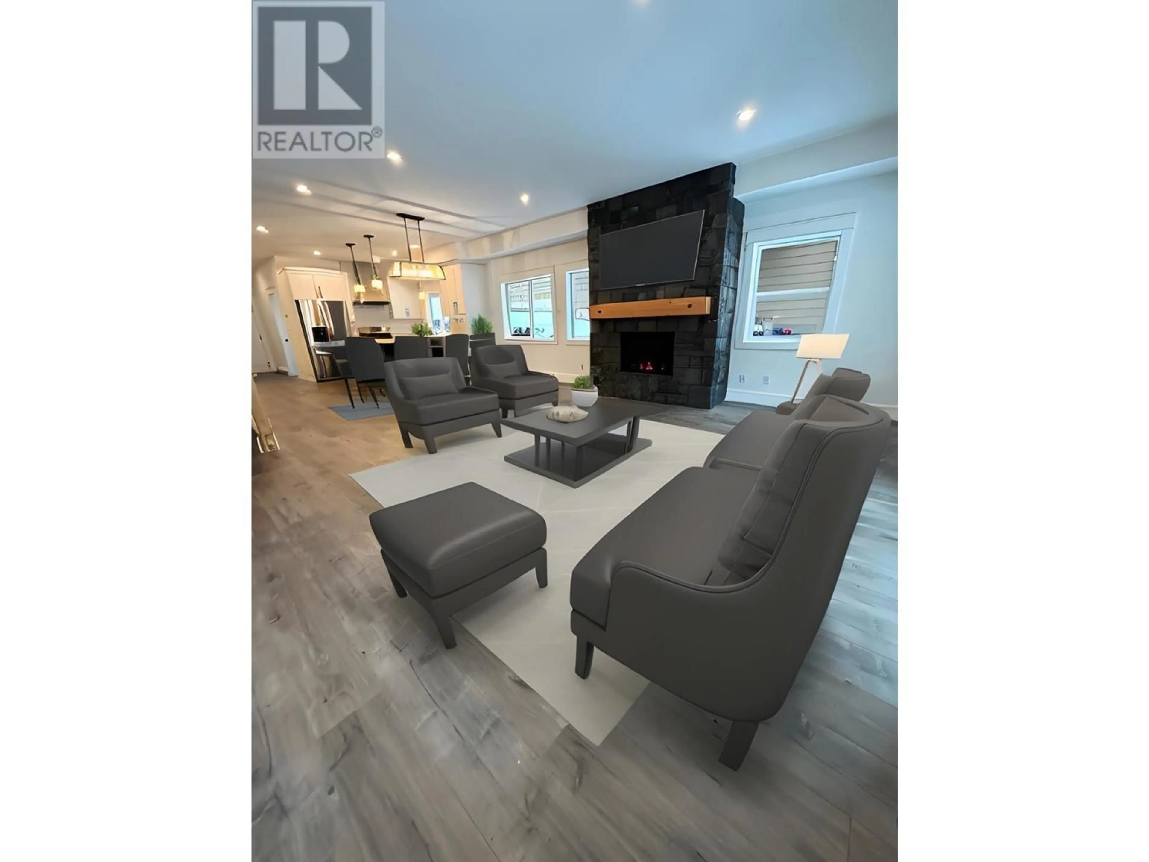 Living room with furniture, wood/laminate floor for 1367 BURFIELD Drive, Sun Peaks British Columbia V0E5N0