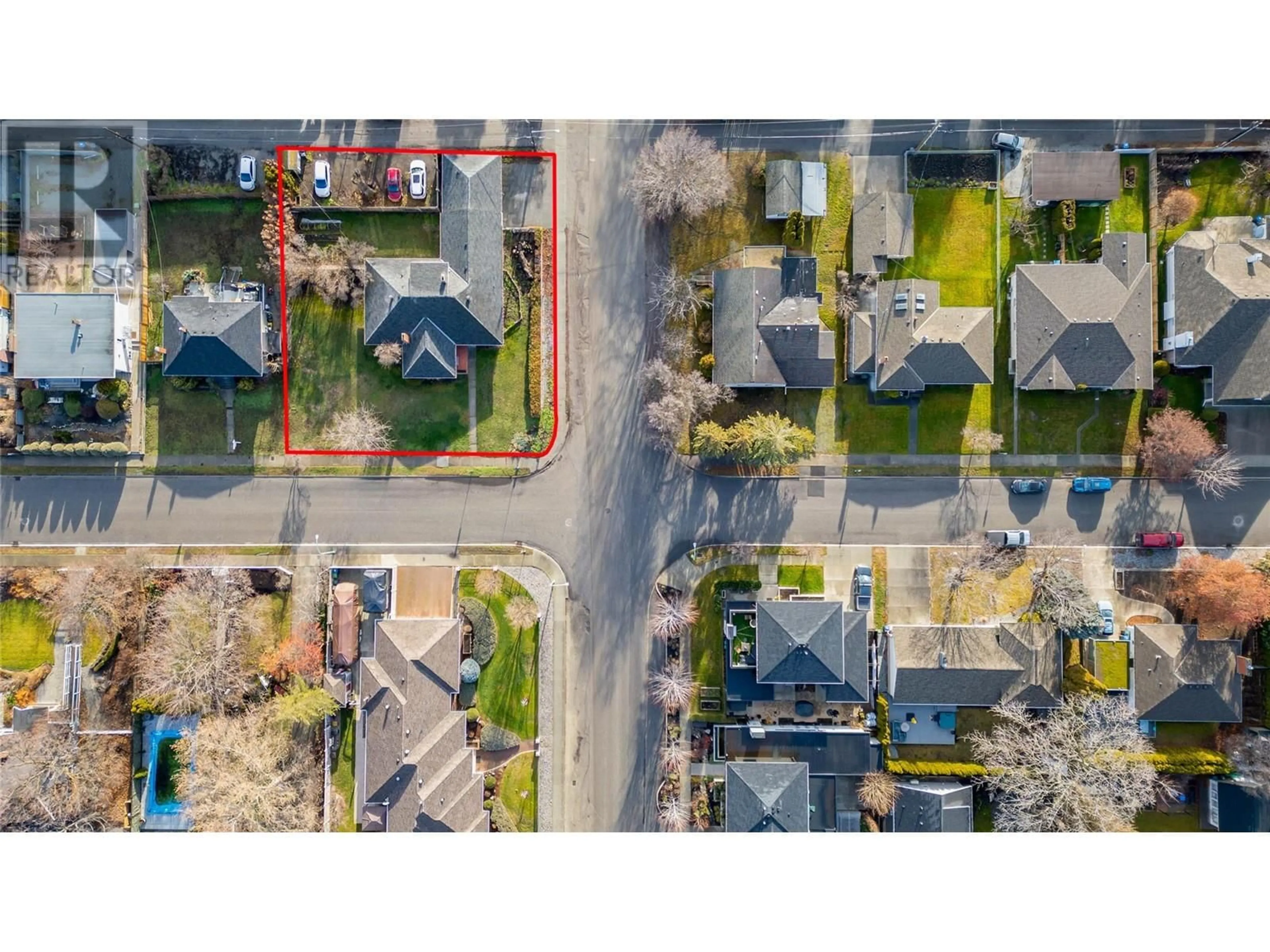 A pic from outside/outdoor area/front of a property/back of a property/a pic from drone, street for 409 Glenwood Avenue, Kelowna British Columbia V1Y5L9