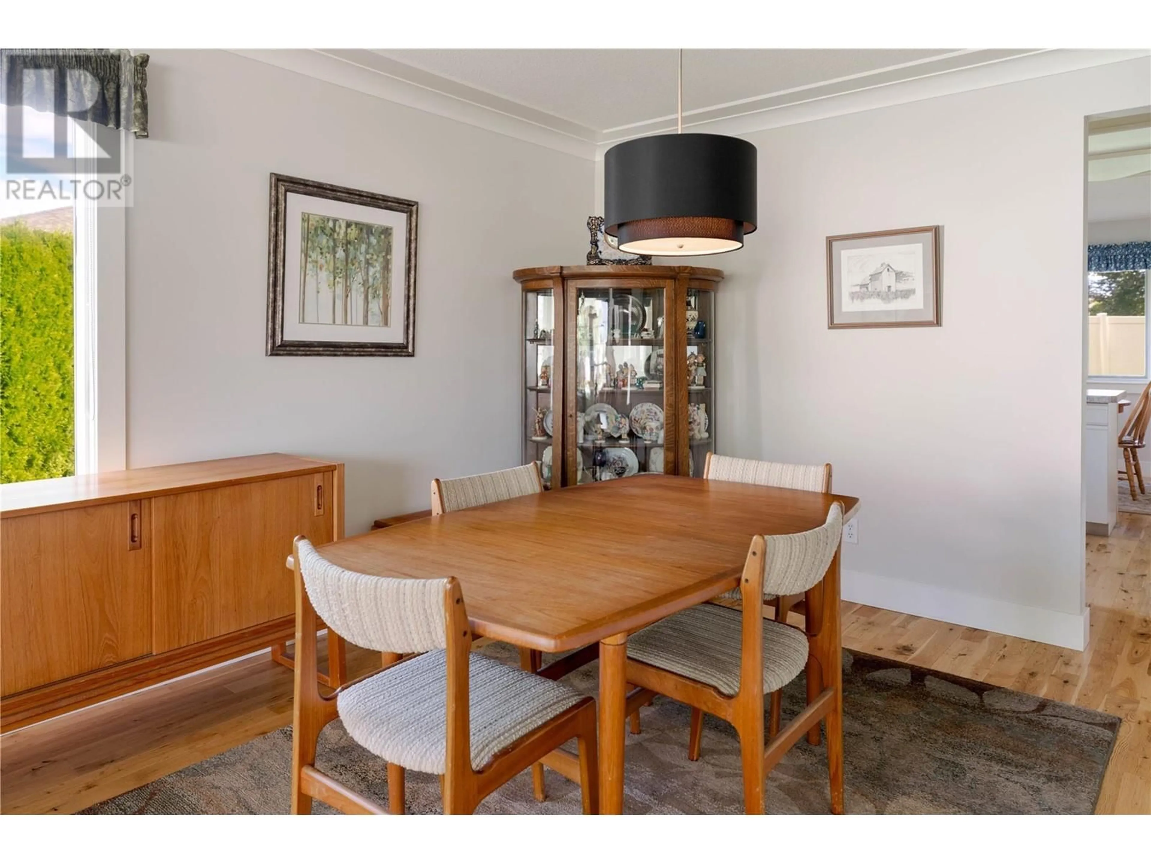 Dining room, wood/laminate floor for 1201 Cameron Avenue Unit# 125, Kelowna British Columbia V1W3S1