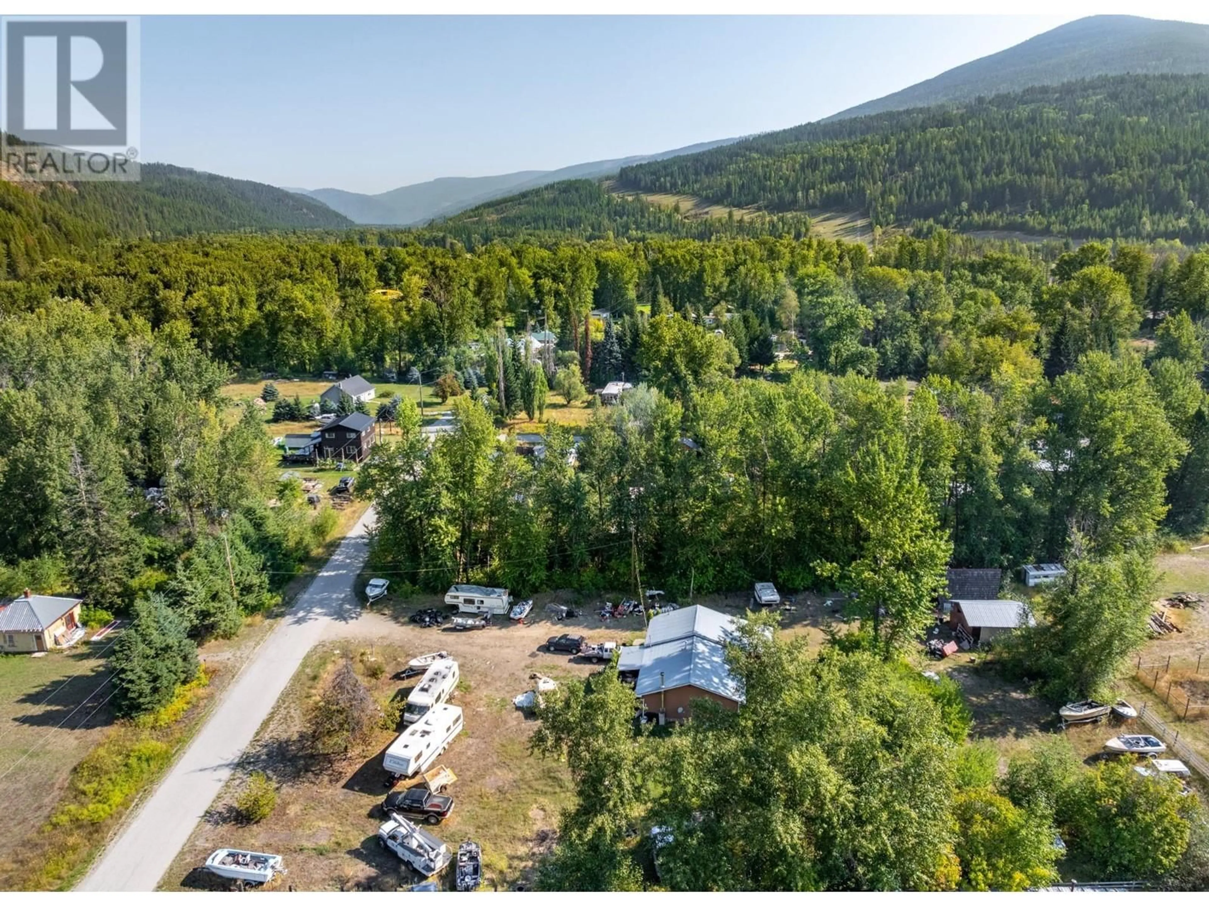 A pic from outside/outdoor area/front of a property/back of a property/a pic from drone, mountain view for 8927 RIVER Avenue, Yahk British Columbia V0B2P0