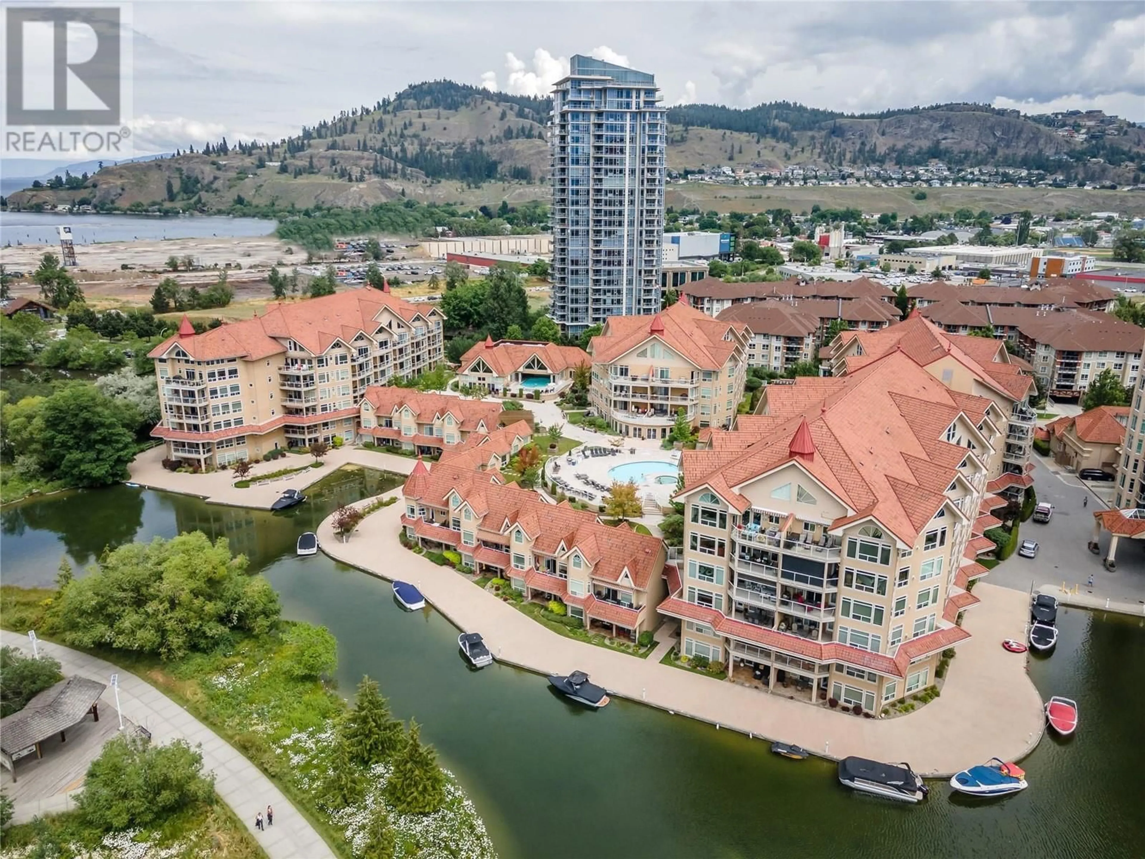 A pic from outside/outdoor area/front of a property/back of a property/a pic from drone, water/lake/river/ocean view for 1088 Sunset Drive Unit# 431, Kelowna British Columbia V1Y9W1