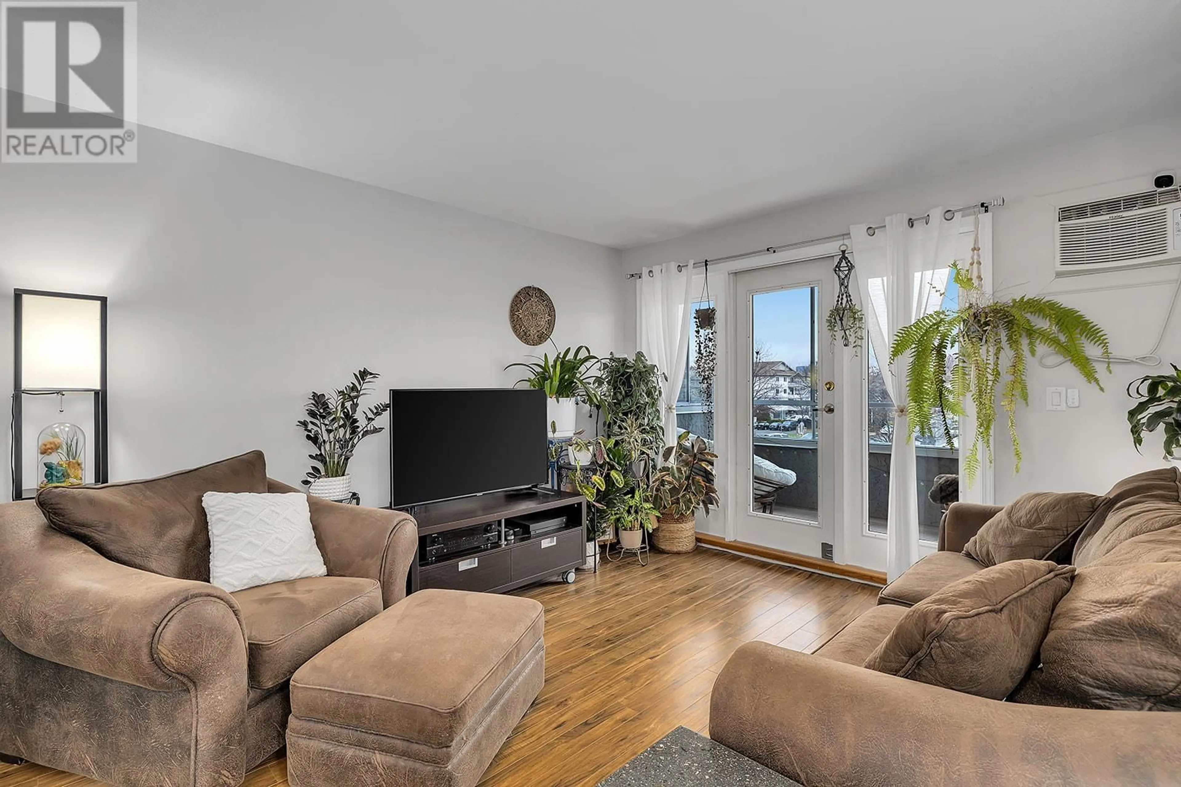 Living room with furniture, unknown for 3175 De Montreuil Court Unit# 301, Kelowna British Columbia V1W3W2