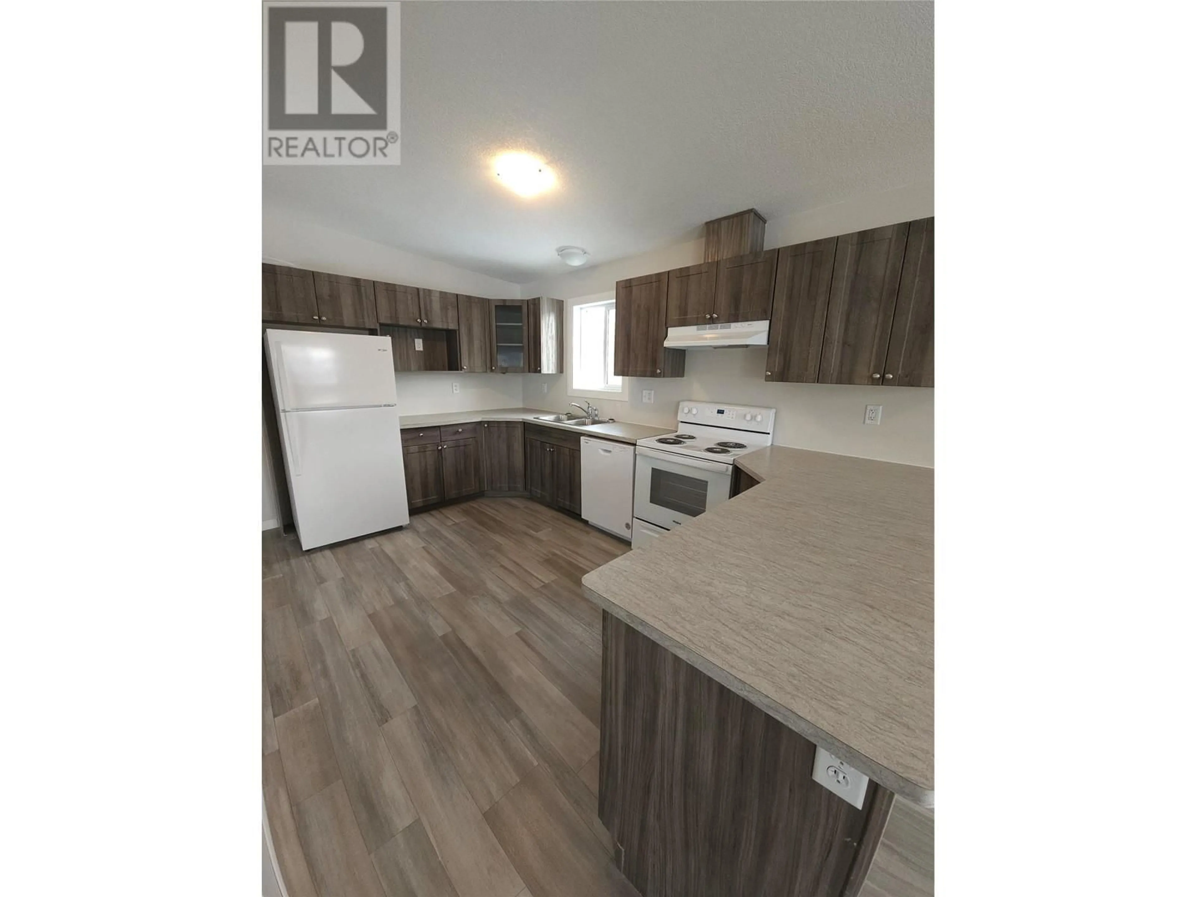 Standard kitchen, wood/laminate floor for 235 Aylmer Road Unit# 52, Chase British Columbia V0E1M1