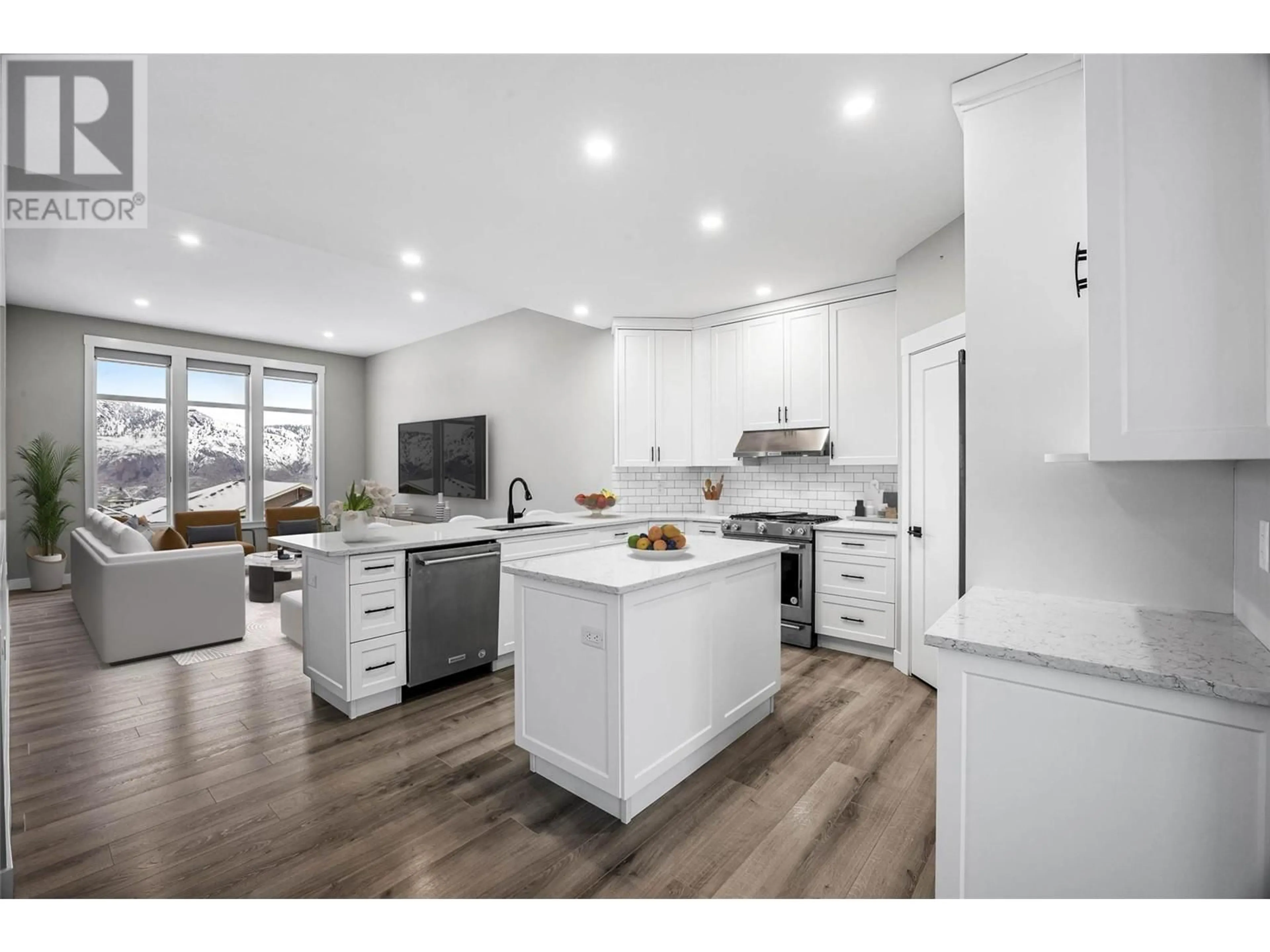 Open concept kitchen, wood/laminate floor for 2045 GALORE Crescent, Kamloops British Columbia V2E0A7