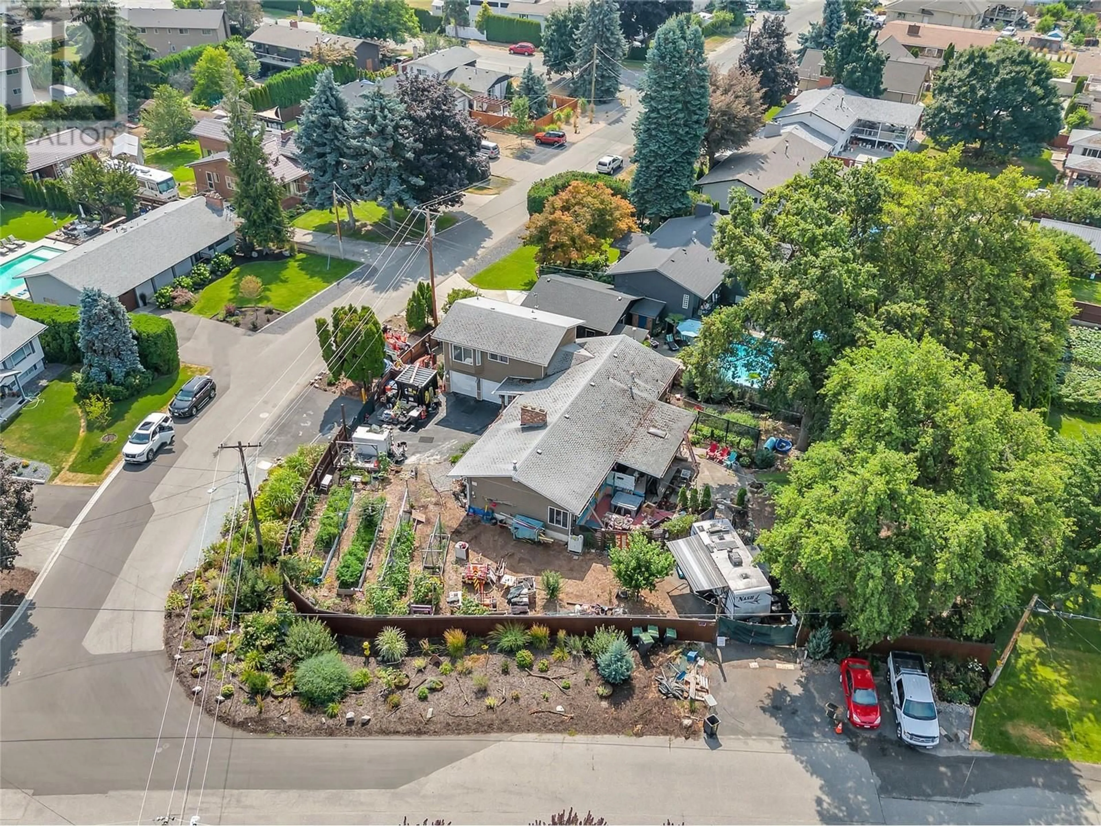 A pic from outside/outdoor area/front of a property/back of a property/a pic from drone, street for 4302 Hazell Road, Kelowna British Columbia V1W1P8