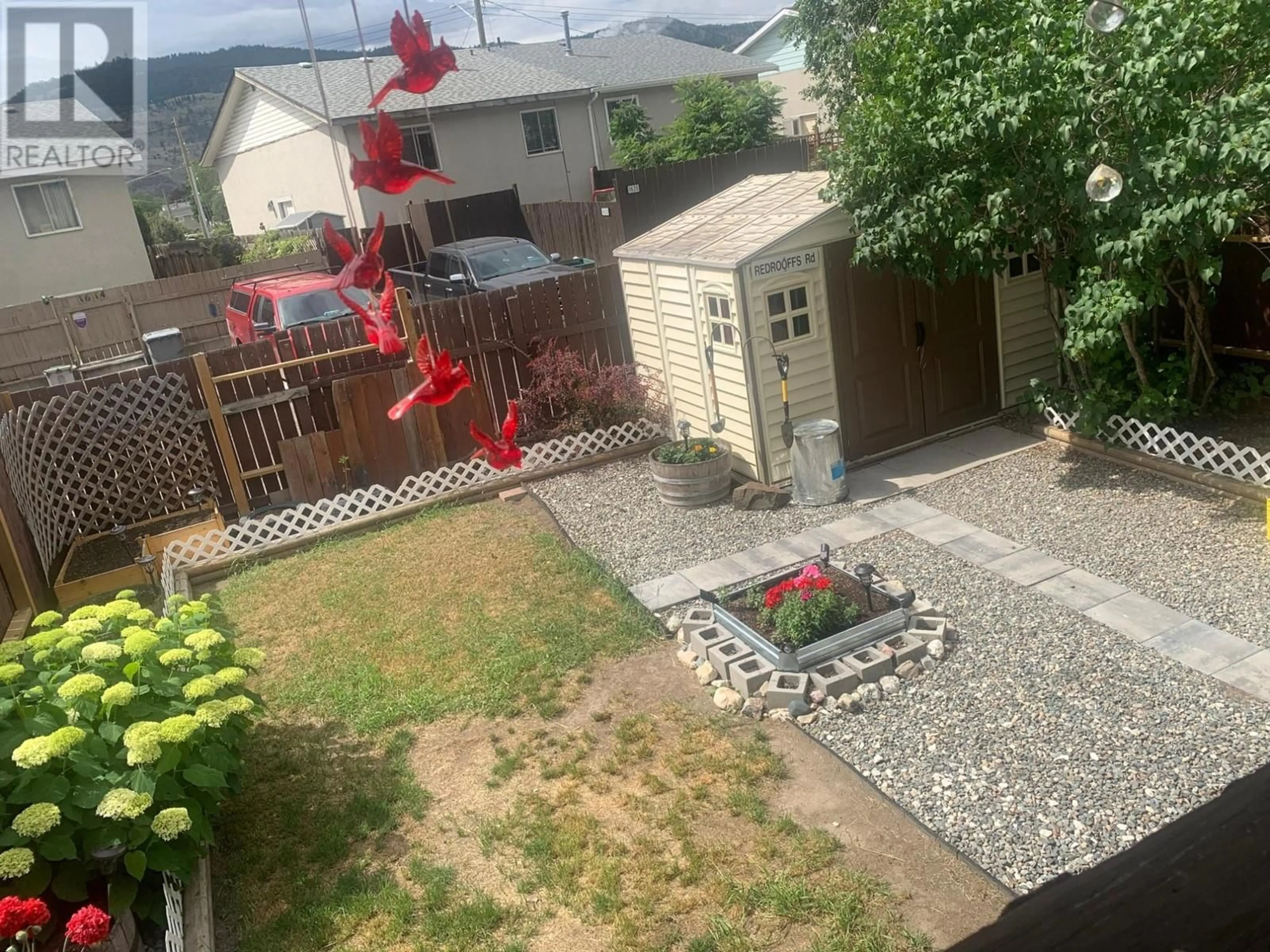 A pic from outside/outdoor area/front of a property/back of a property/a pic from drone, street for 1611 SPARTAN Place, Kamloops British Columbia V2B7Z3