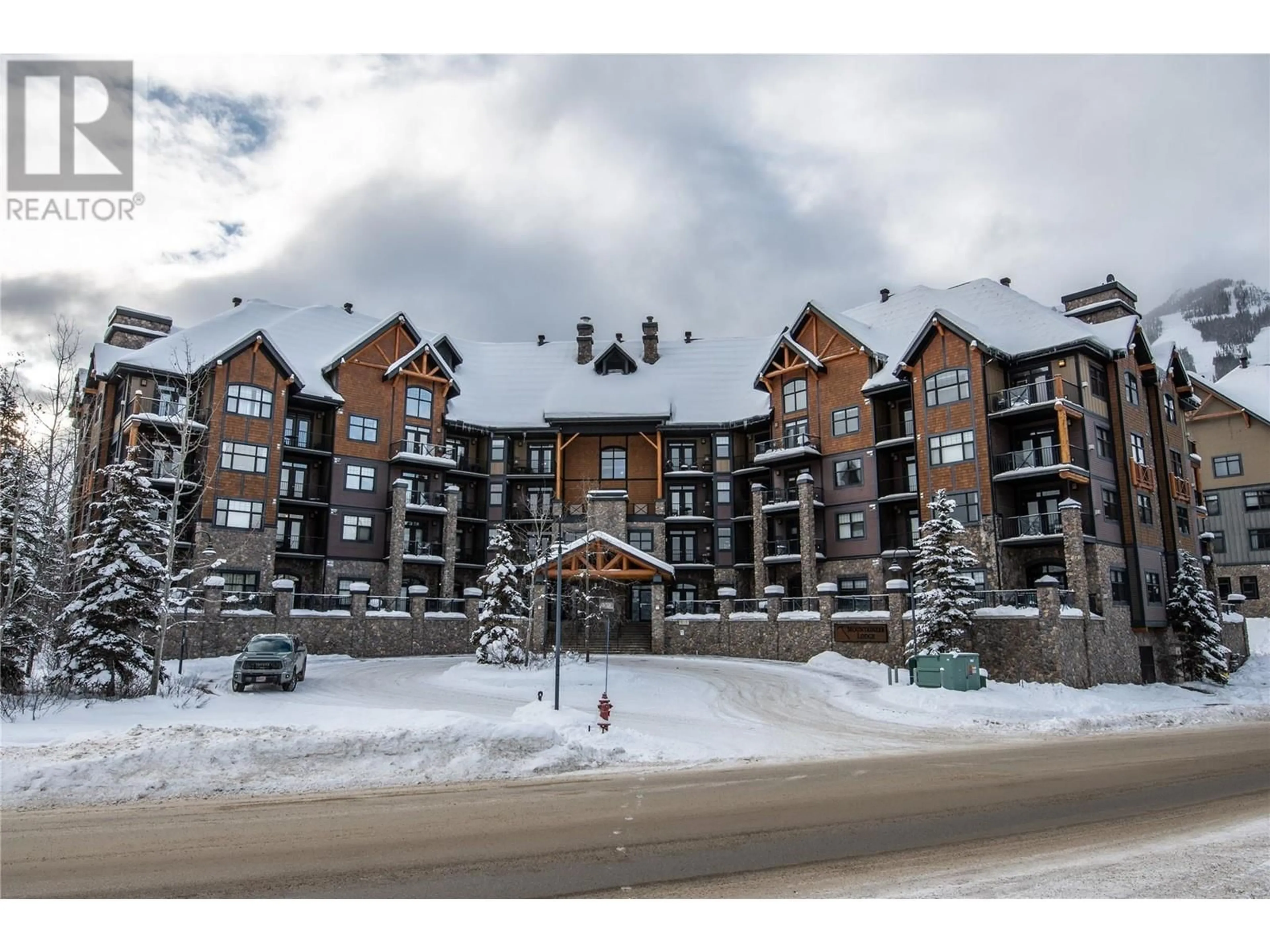 A pic from outside/outdoor area/front of a property/back of a property/a pic from drone, mountain view for 1545 KICKING HORSE Trail Unit# 102, Golden British Columbia V0A1H2