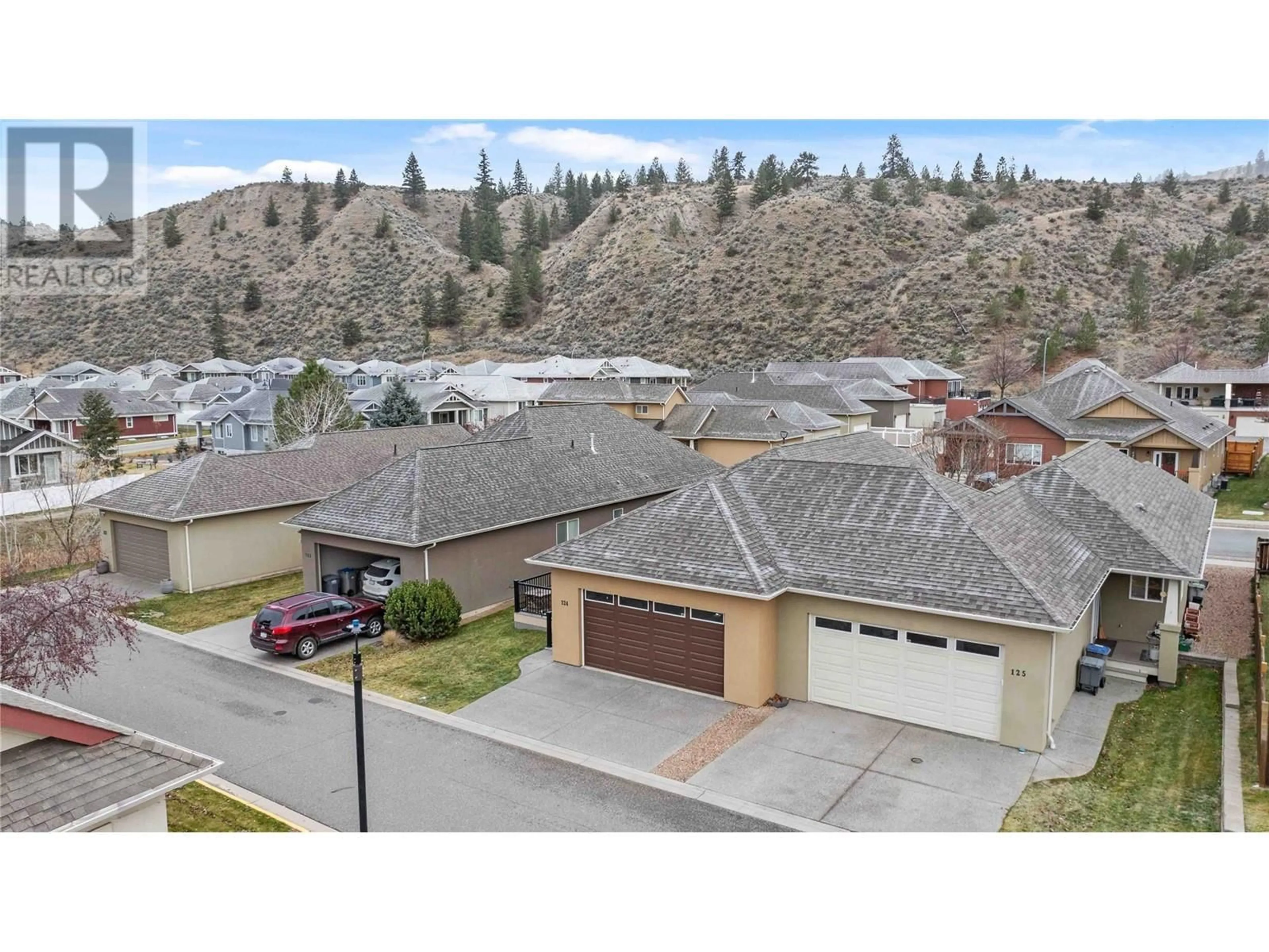 A pic from outside/outdoor area/front of a property/back of a property/a pic from drone, mountain view for 2920 Valleyview Drive Unit# 124, Kamloops British Columbia V2C0A8