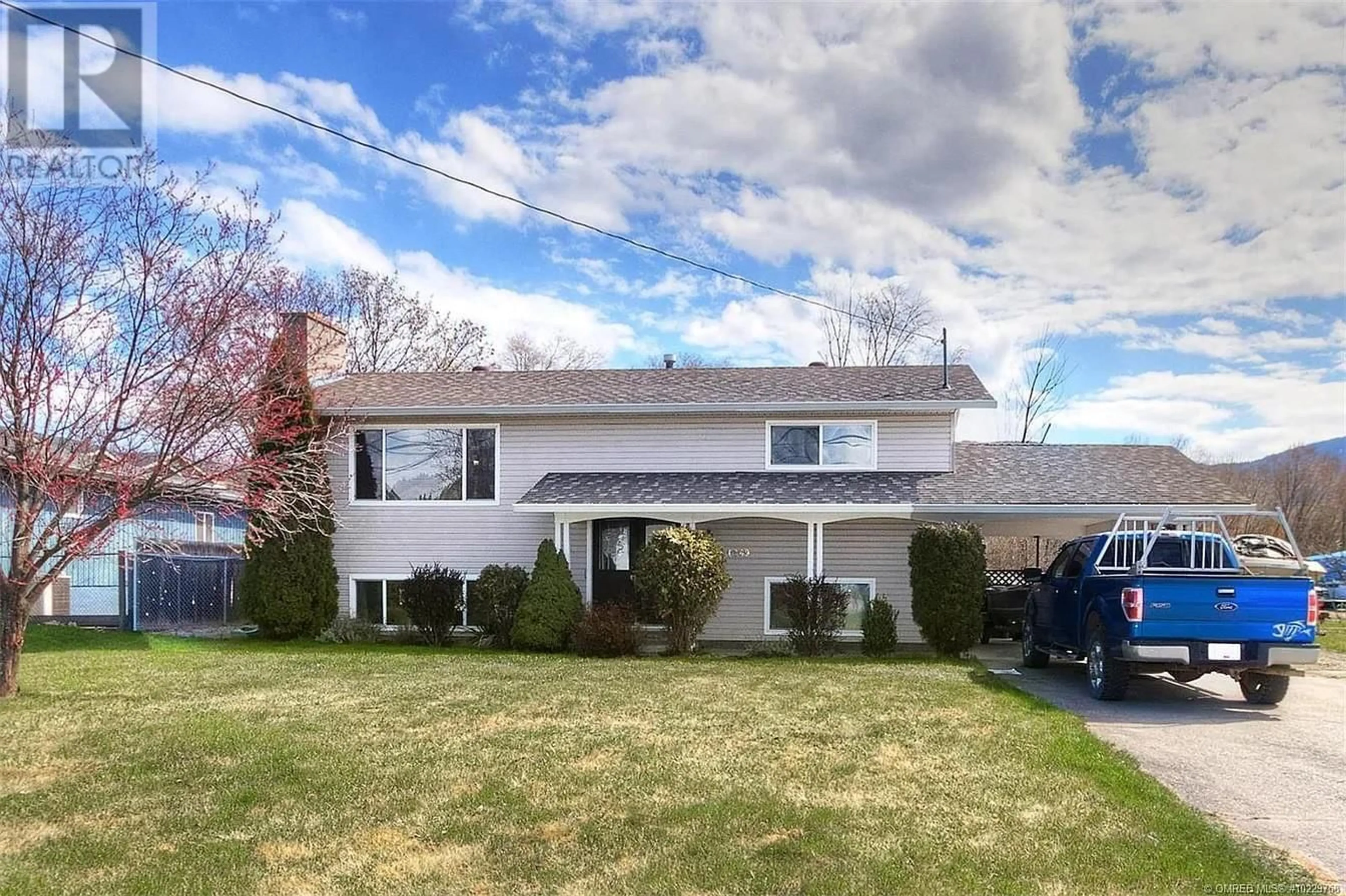 Home with vinyl exterior material, street for 1269 FINDLAY ROAD, Kelowna British Columbia V1X5B1