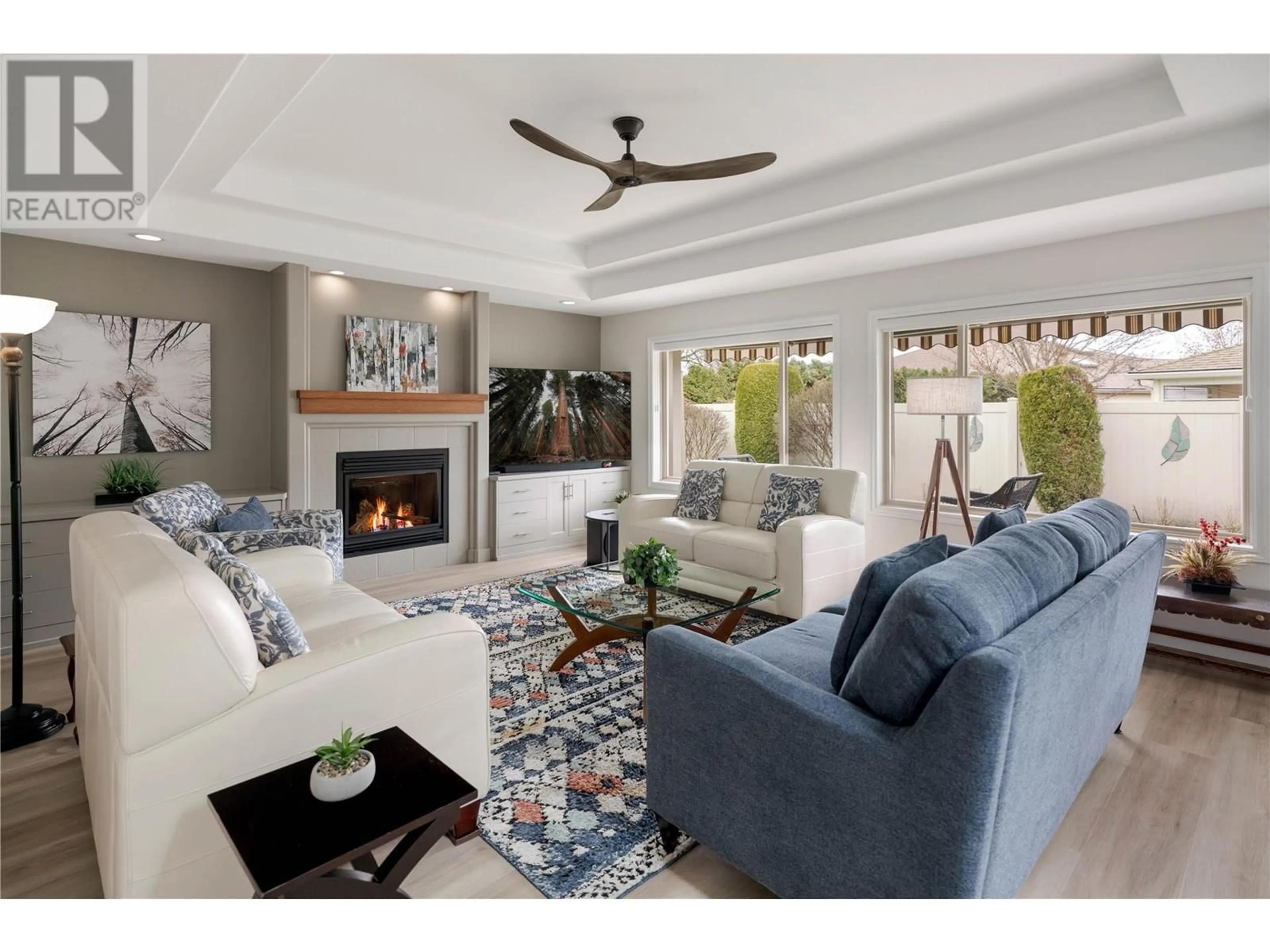 Living room with furniture, unknown for 2365 Stillingfleet Road Unit# 360, Kelowna British Columbia V1W4X5