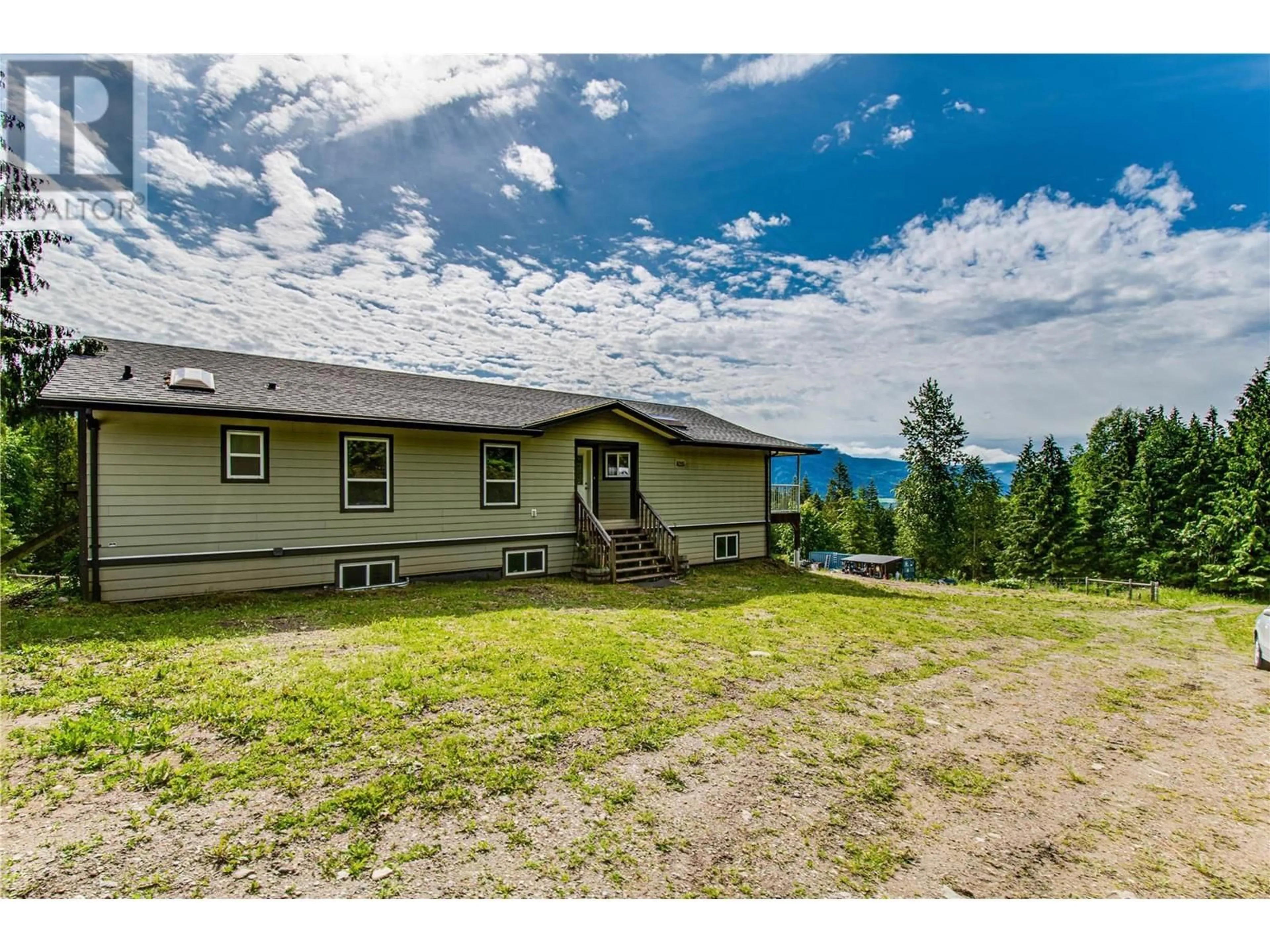 A pic from outside/outdoor area/front of a property/back of a property/a pic from drone, mountain view for 31 Violet Road, Grindrod British Columbia V0E1Y0