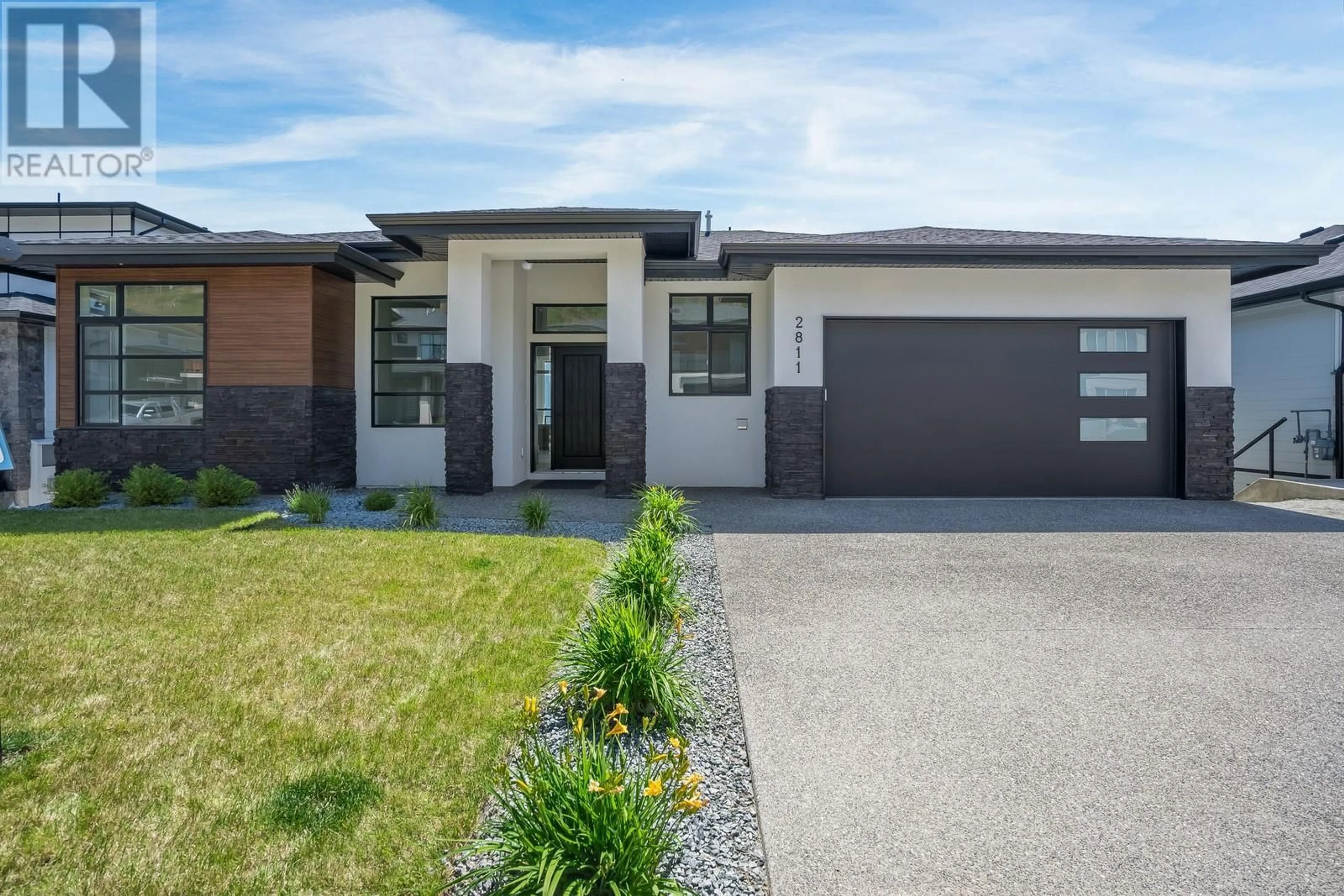 Home with brick exterior material, street for 2811 COPPER RIDGE DRIVE, West Kelowna British Columbia V4T0E7