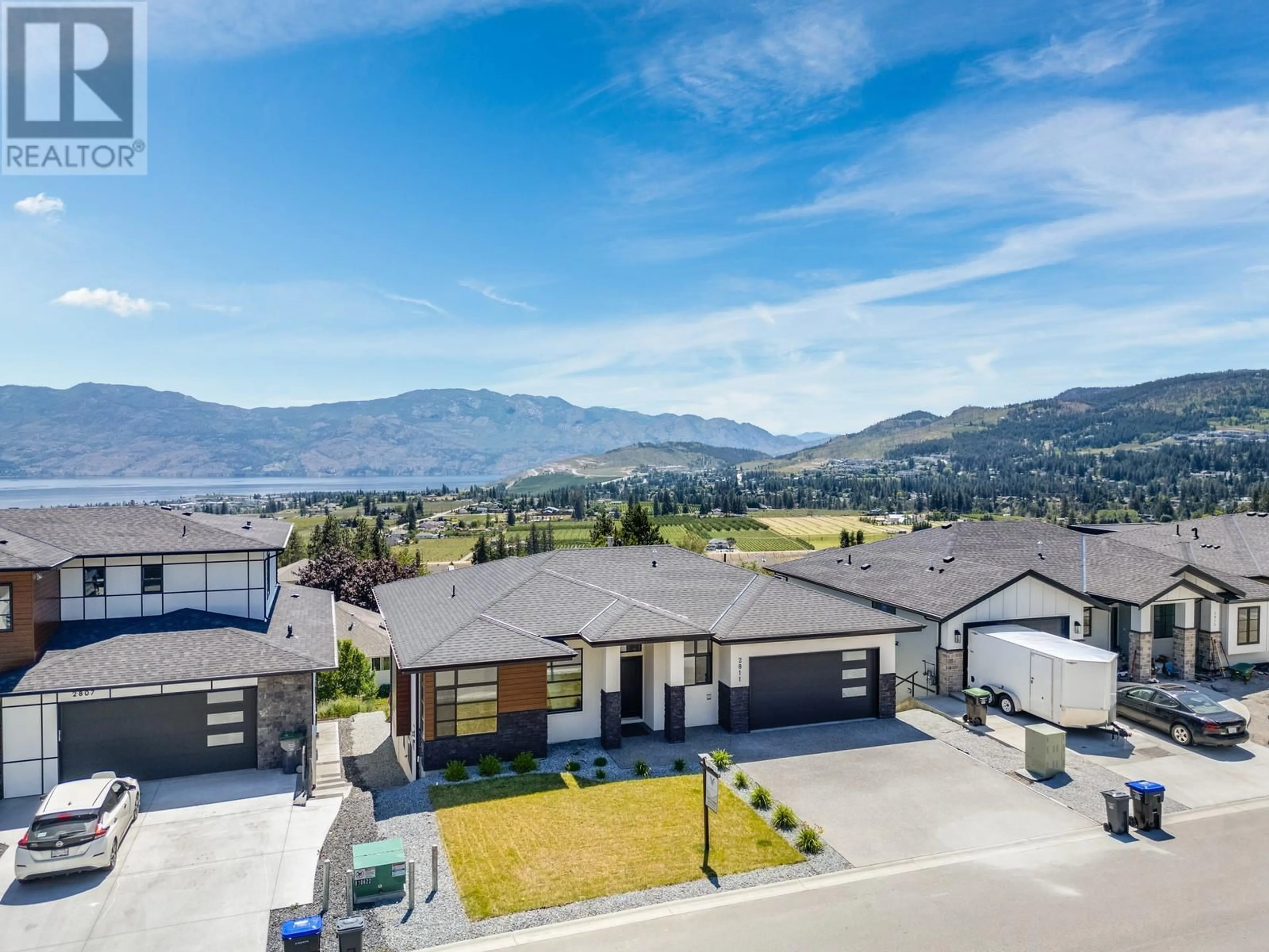 A pic from outside/outdoor area/front of a property/back of a property/a pic from drone, mountain view for 2811 COPPER RIDGE DRIVE, West Kelowna British Columbia V4T0E7