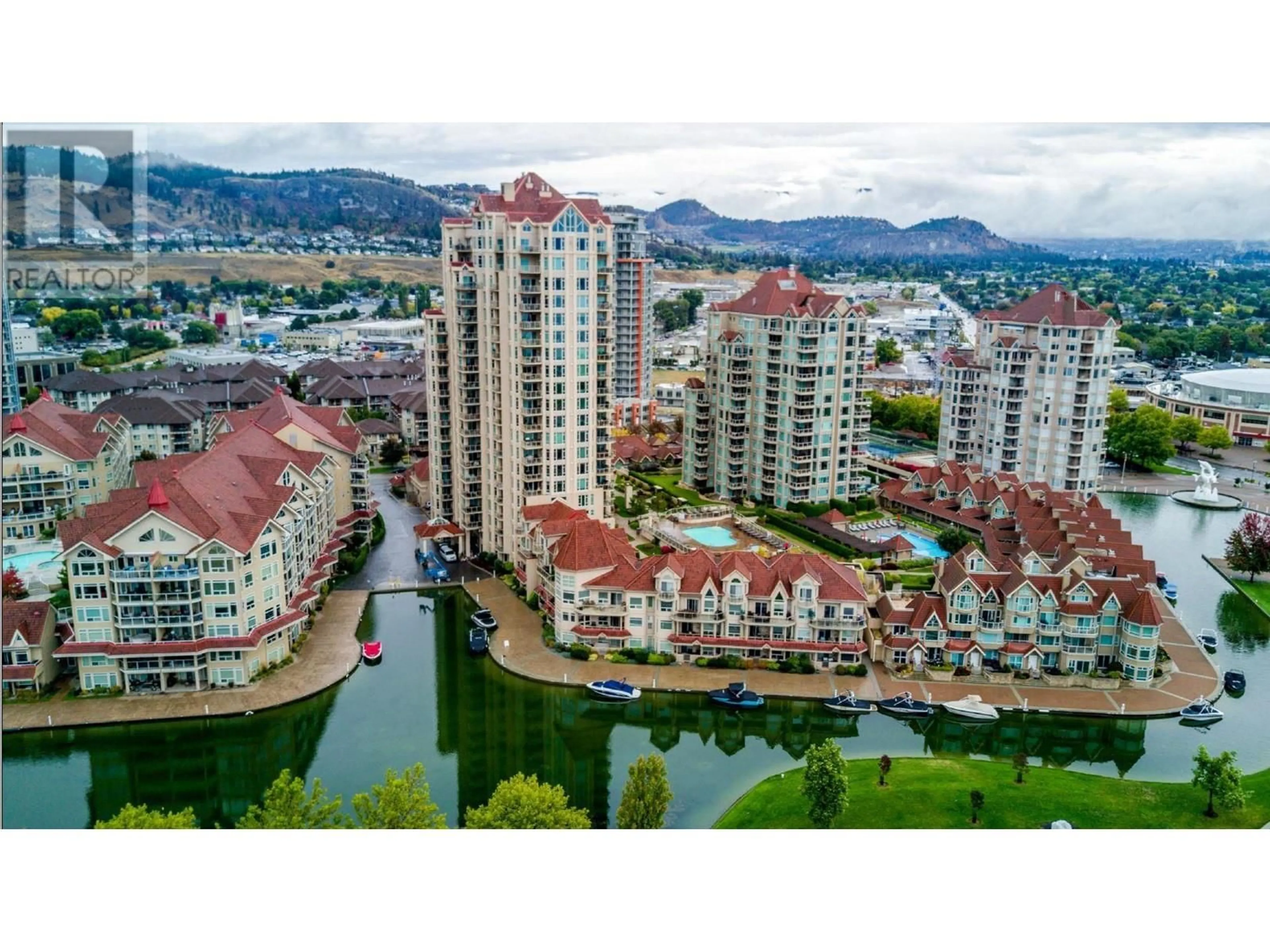 A pic from outside/outdoor area/front of a property/back of a property/a pic from drone, city buildings view from balcony for 1128 Sunset Drive Unit# 407, Kelowna British Columbia V1Y9W7