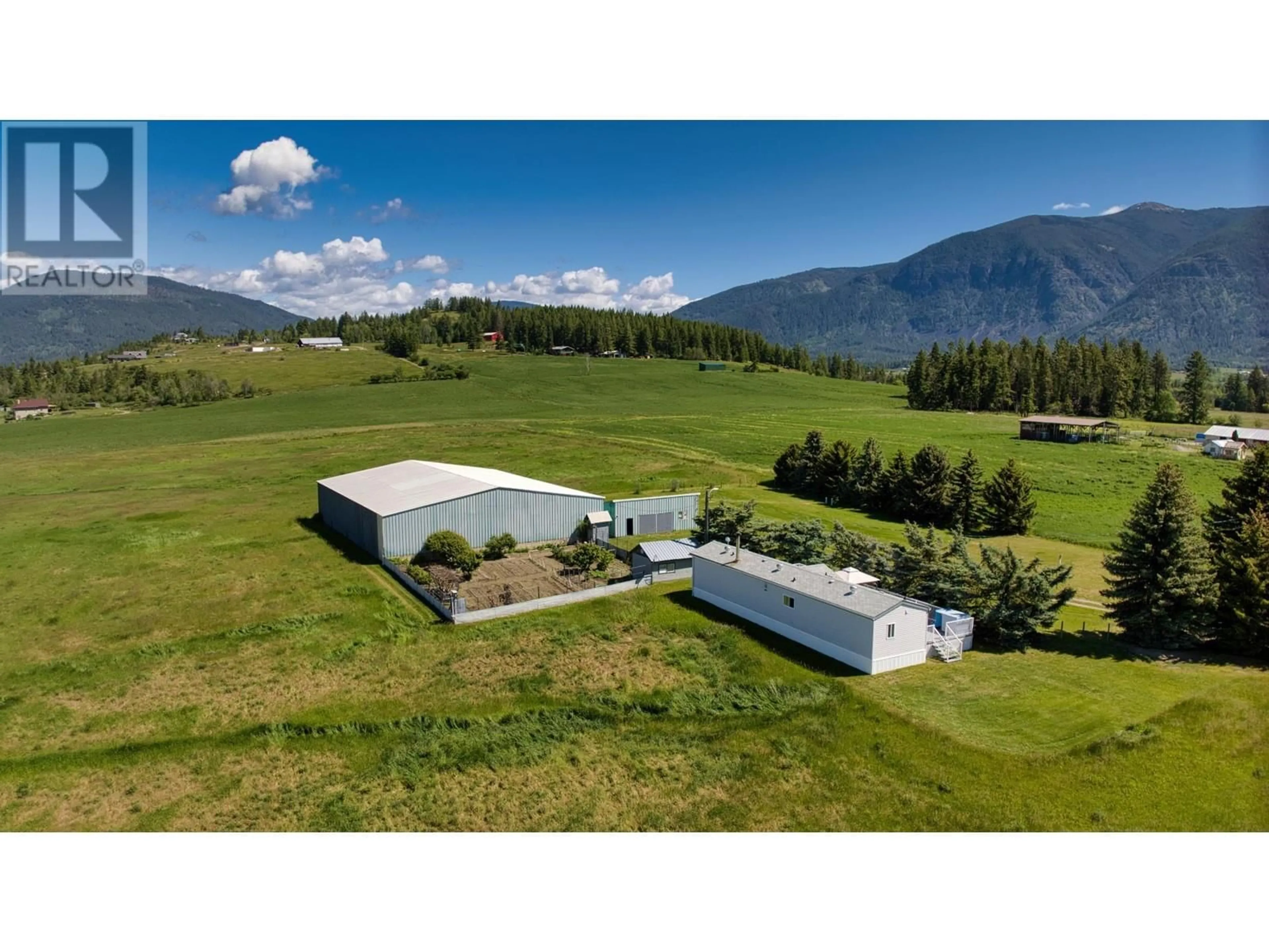 A pic from outside/outdoor area/front of a property/back of a property/a pic from drone, mountain view for 2404 28TH Street, Lister British Columbia V0B1G2