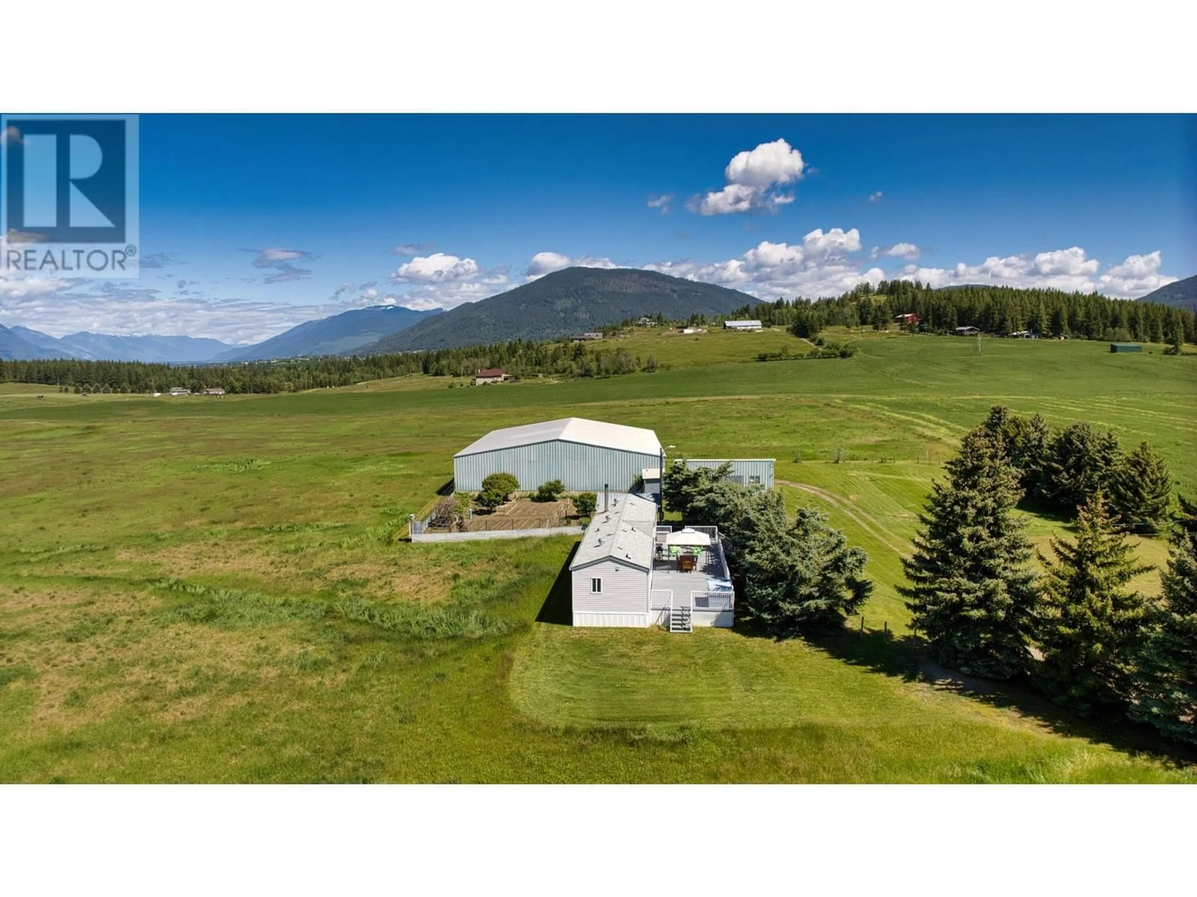 A pic from outside/outdoor area/front of a property/back of a property/a pic from drone, mountain view for 2404 28TH Street, Lister British Columbia V0B1G2