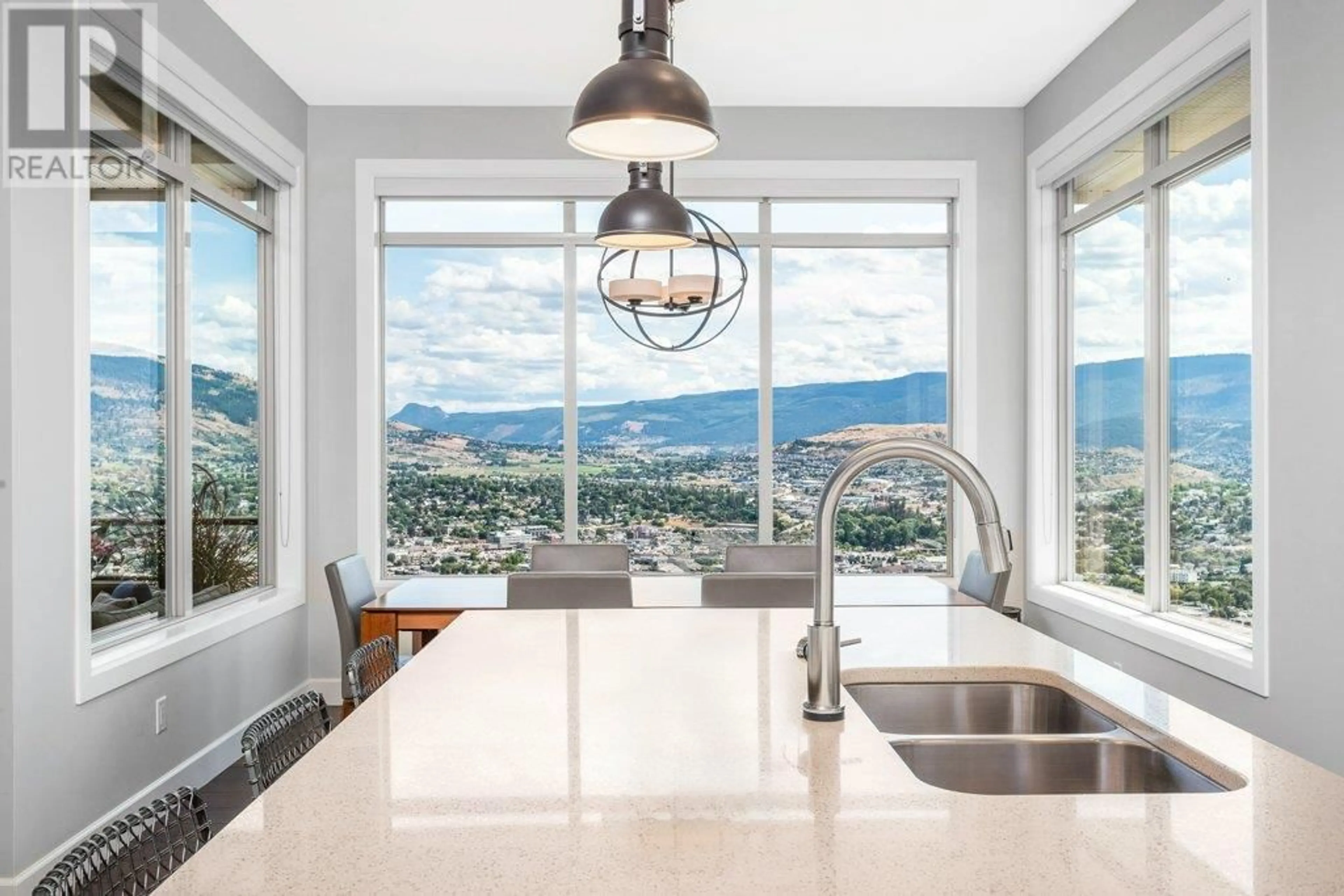 Contemporary kitchen, ceramic/tile floor for 3812 Terrapin Place, Vernon British Columbia V1T9Y2