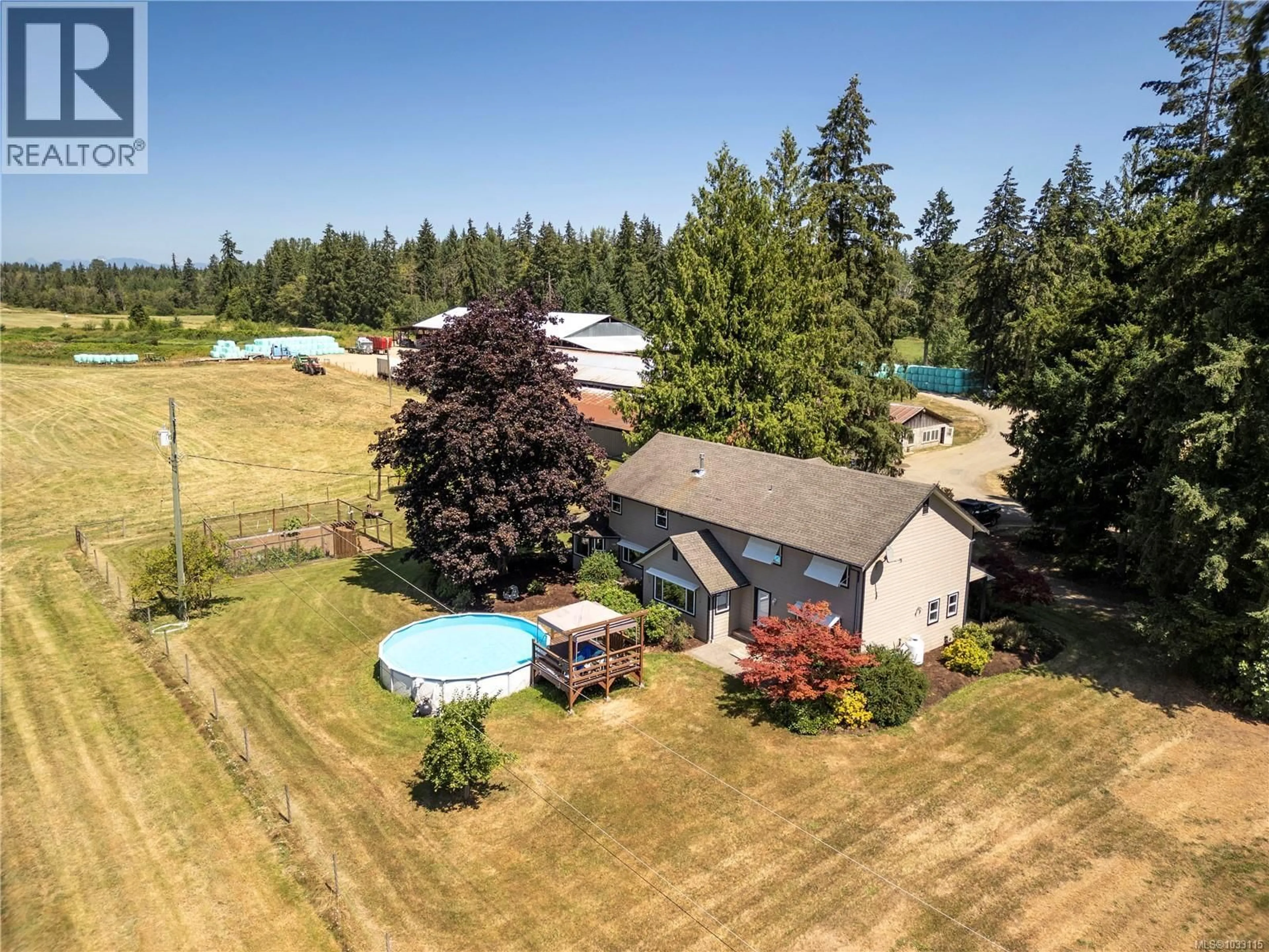 A pic from outside/outdoor area/front of a property/back of a property/a pic from drone, unknown for 2332 ENDALL ROAD, Black Creek British Columbia V9J1G7