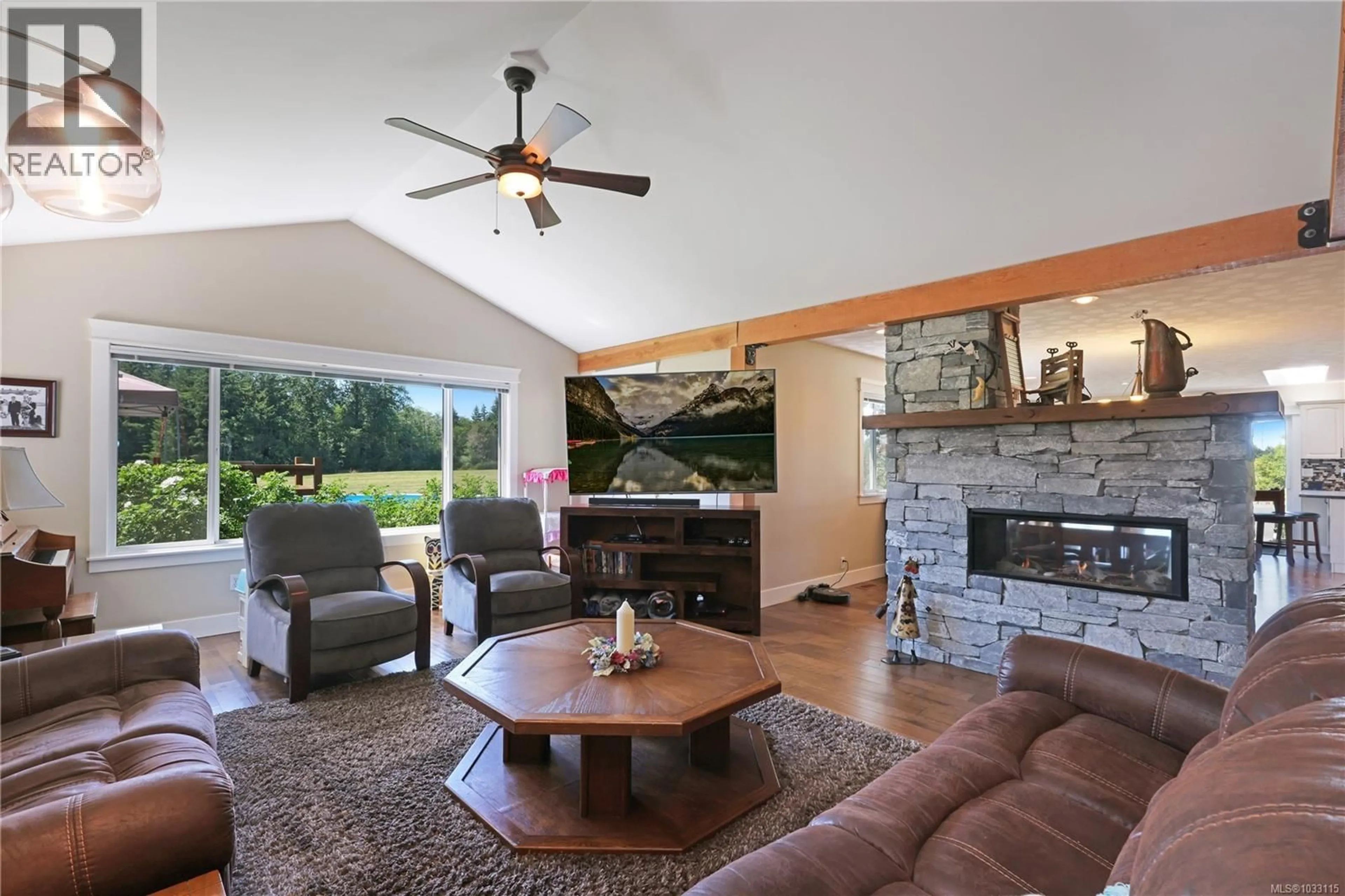 Living room with furniture, ceramic/tile floor for 2332 ENDALL ROAD, Black Creek British Columbia V9J1G7