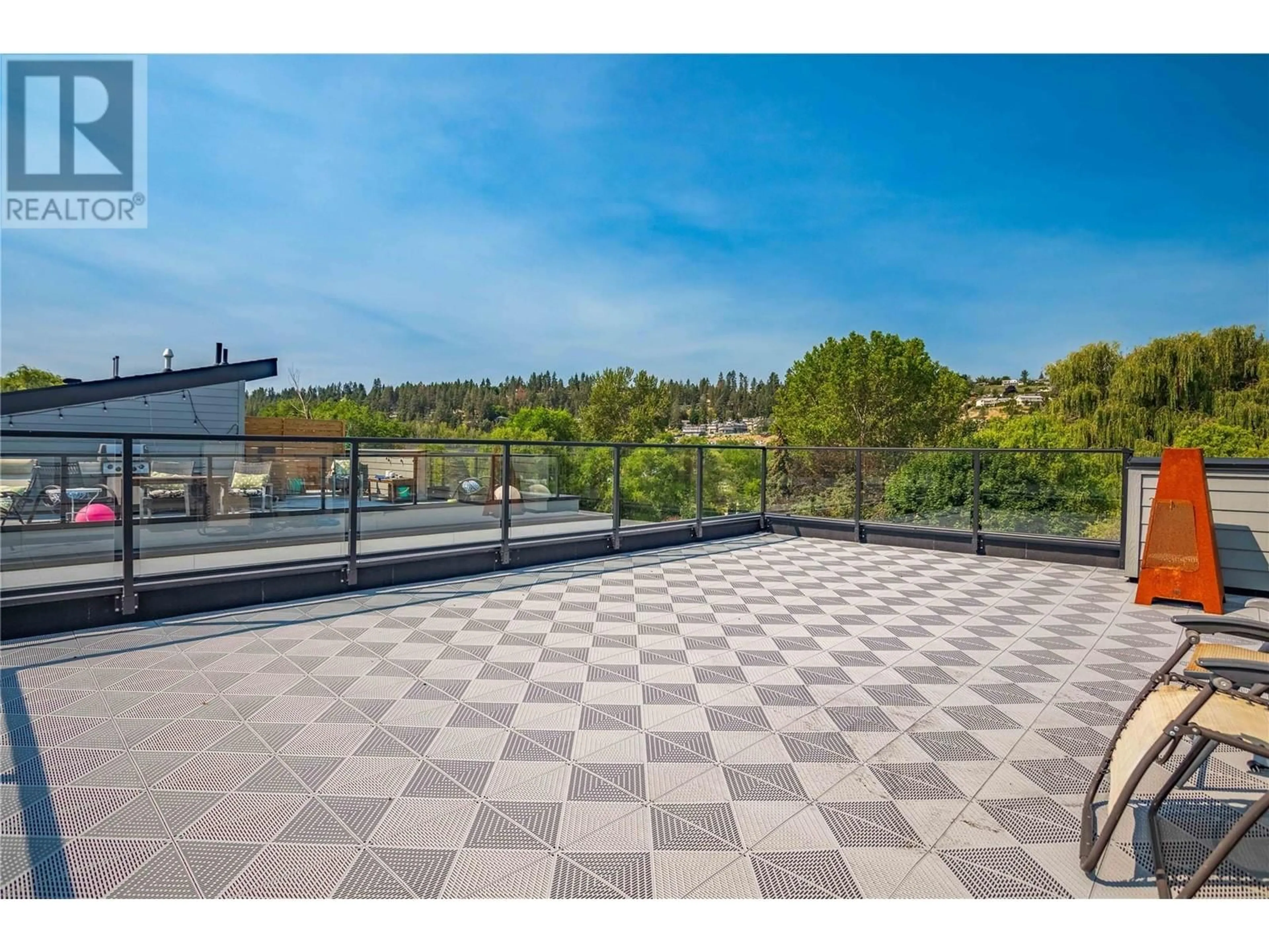 Patio, city buildings view from balcony for 11592 Rogers Road Unit# 15, Lake Country British Columbia V4V1X8