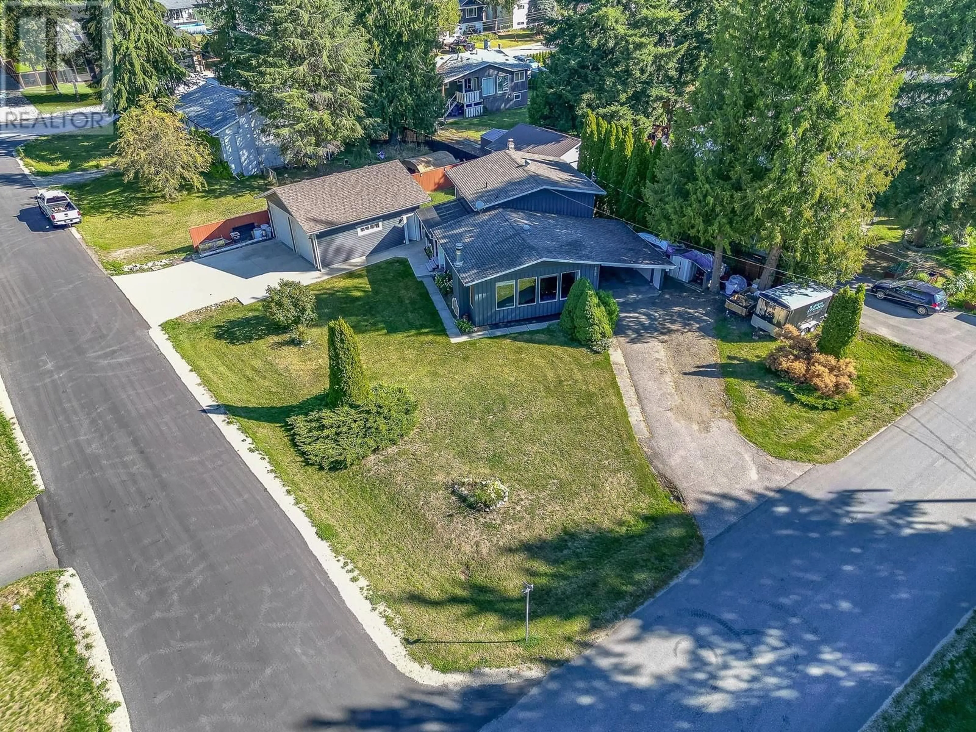 A pic from outside/outdoor area/front of a property/back of a property/a pic from drone, street for 602 Maple Street, Sicamous British Columbia V0E2V1