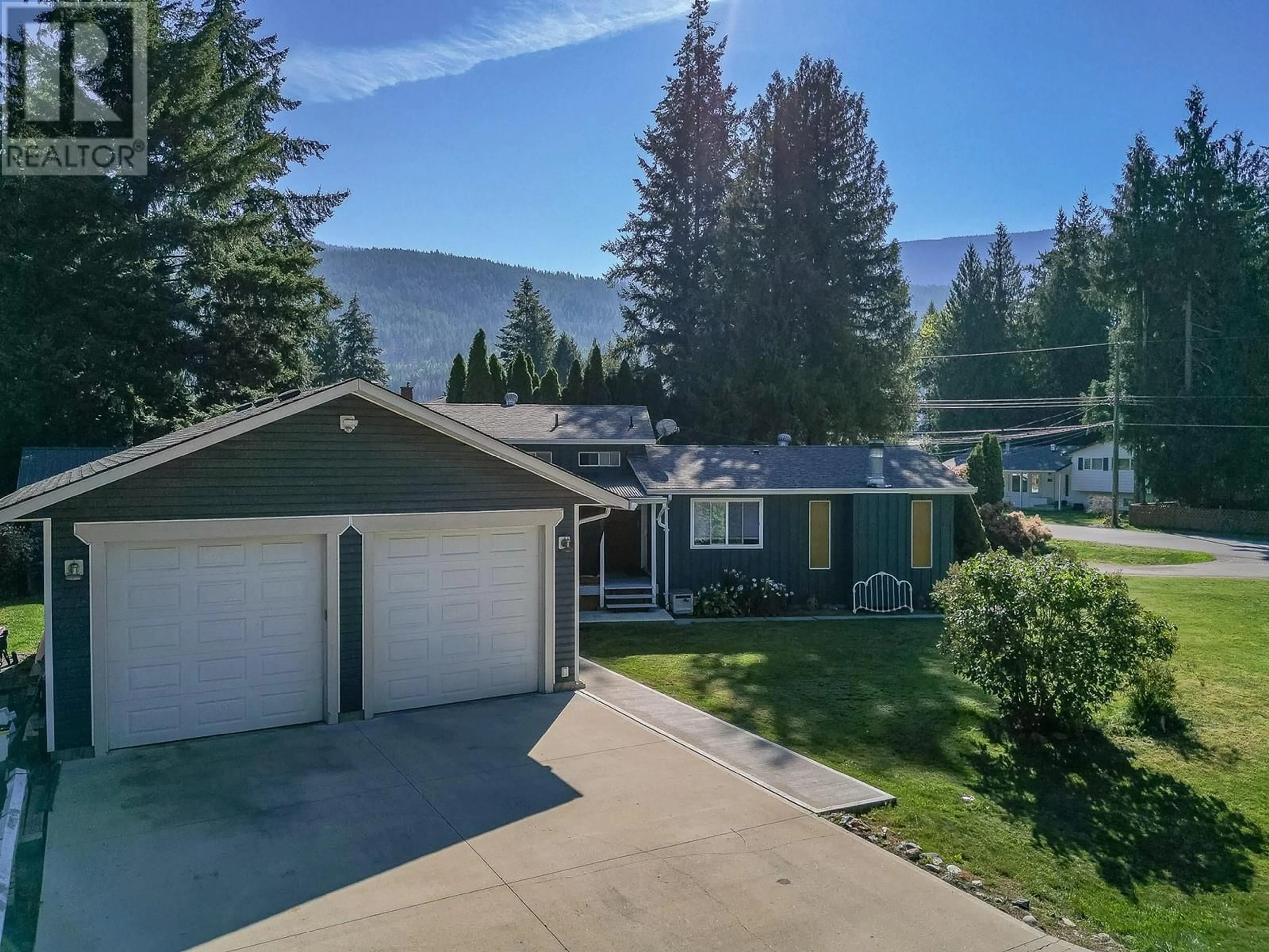 A pic from outside/outdoor area/front of a property/back of a property/a pic from drone, mountain view for 602 Maple Street, Sicamous British Columbia V0E2V1