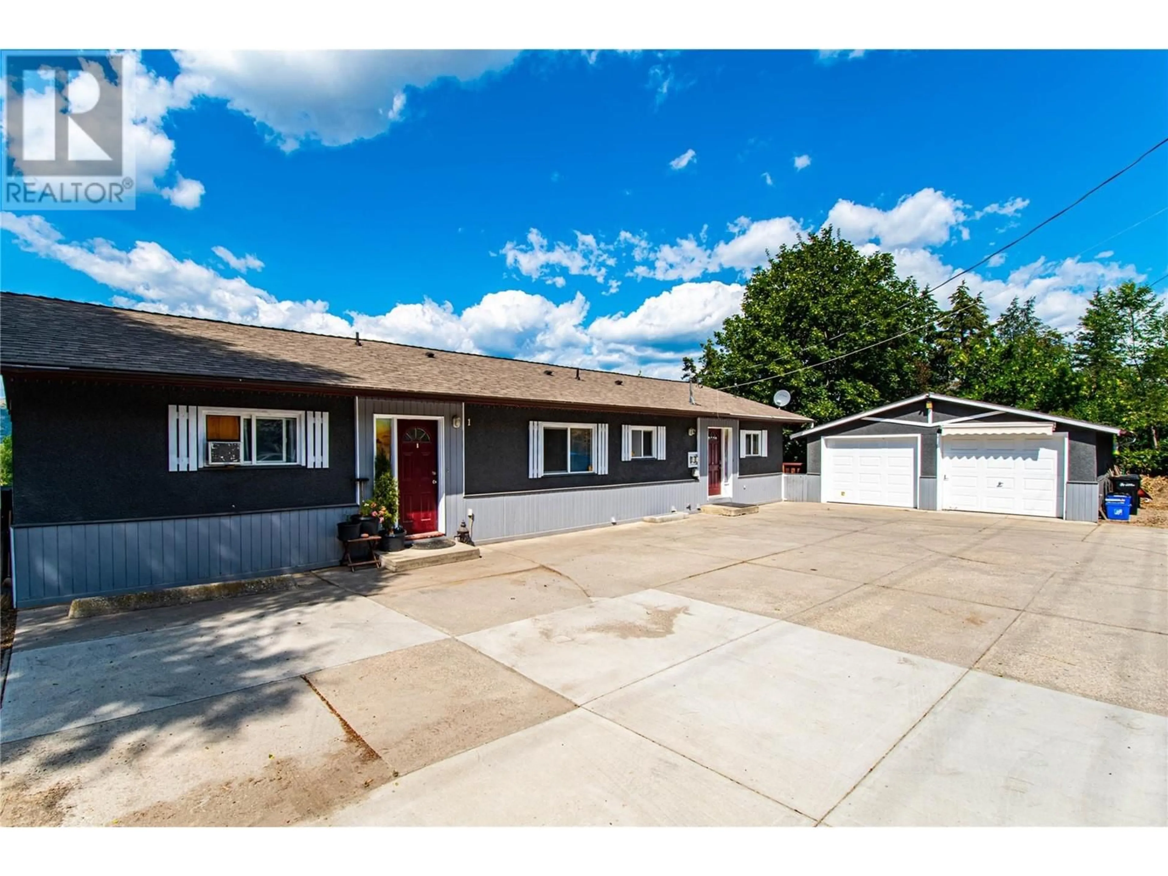 Home with vinyl exterior material, street for 4904 PLEASANT VALLEY ROAD, Vernon British Columbia V1B3L7