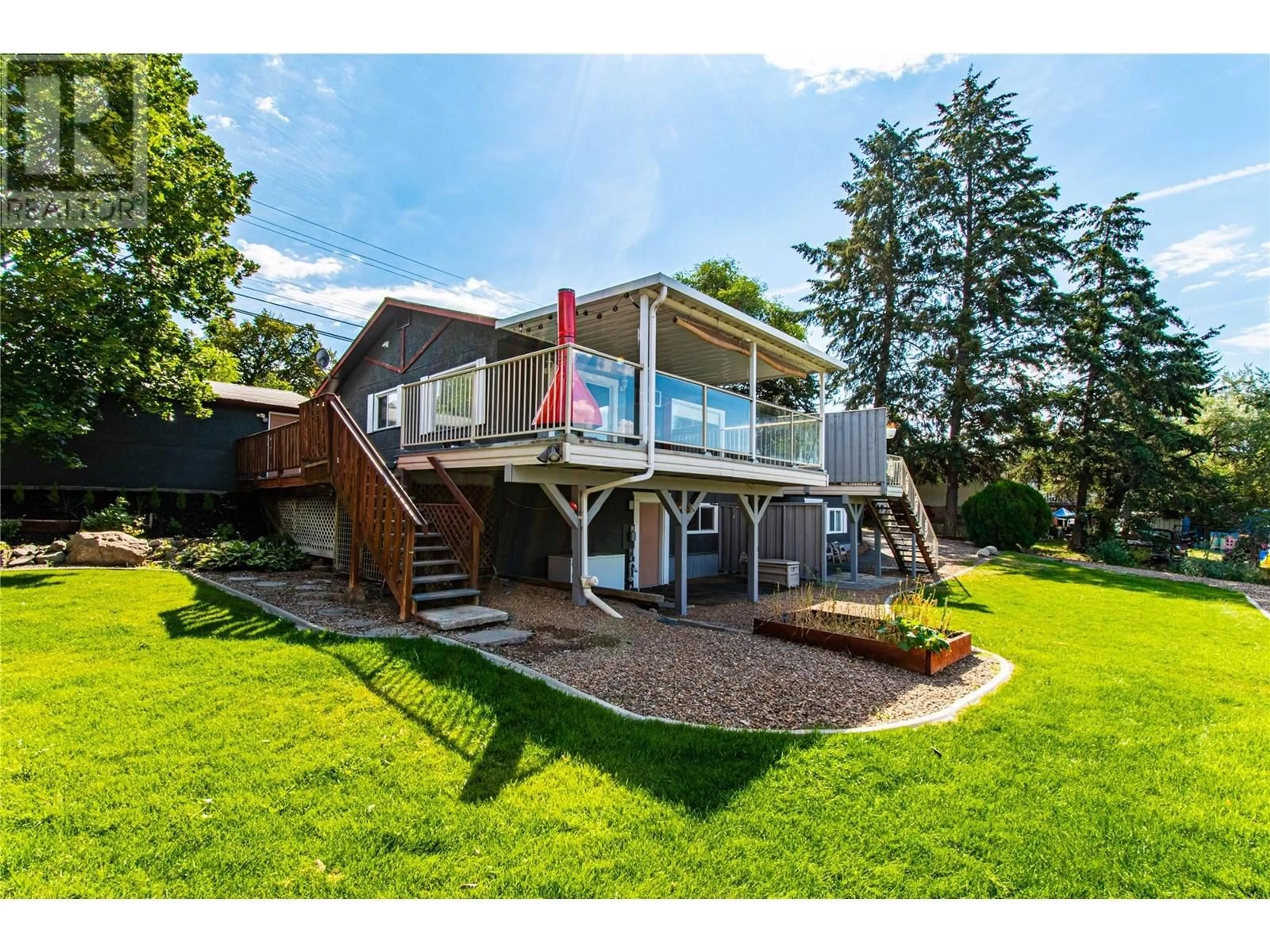 A pic from outside/outdoor area/front of a property/back of a property/a pic from drone, water/lake/river/ocean view for 4904 PLEASANT VALLEY ROAD, Vernon British Columbia V1B3L7