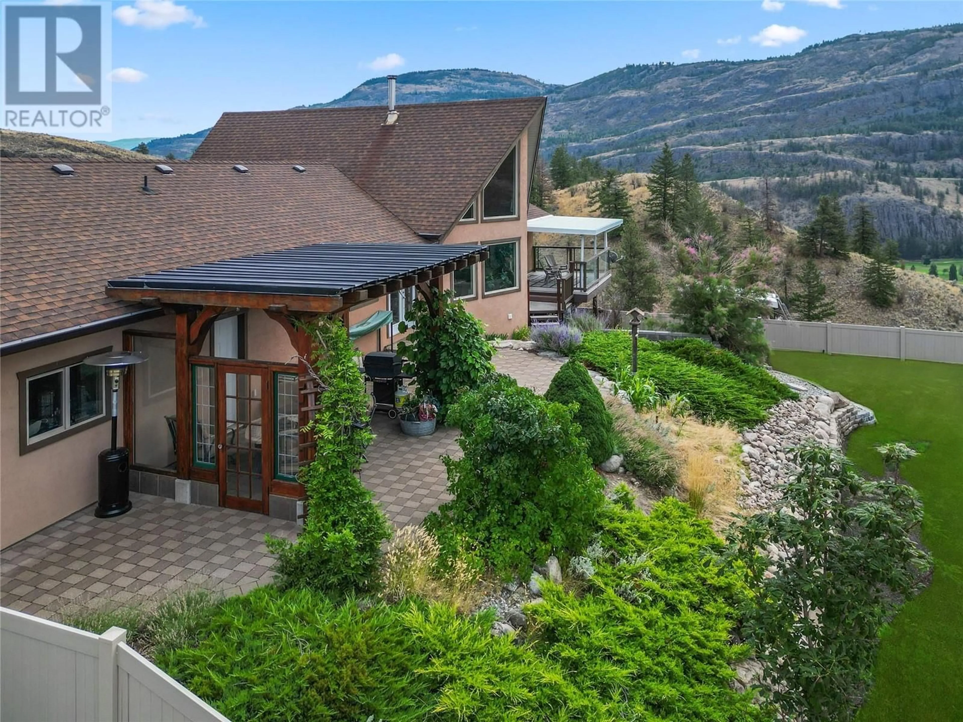 A pic from outside/outdoor area/front of a property/back of a property/a pic from drone, mountain view for 771 Toy Creek Road, Kaleden British Columbia V0H1K0