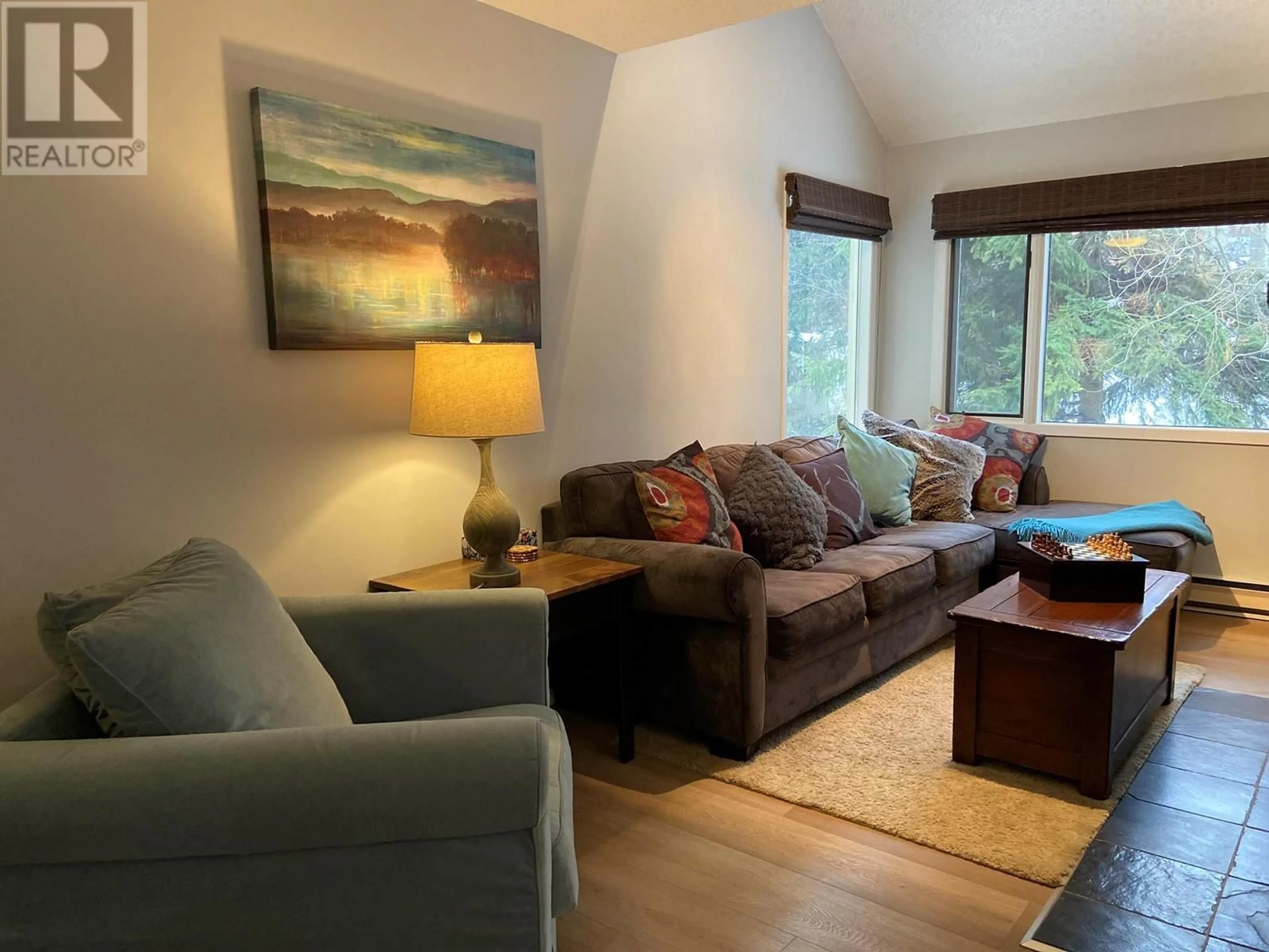 Living room with furniture, wood/laminate floor for 2035 Panorama Drive Unit# 131, Panorama British Columbia V0A1T0