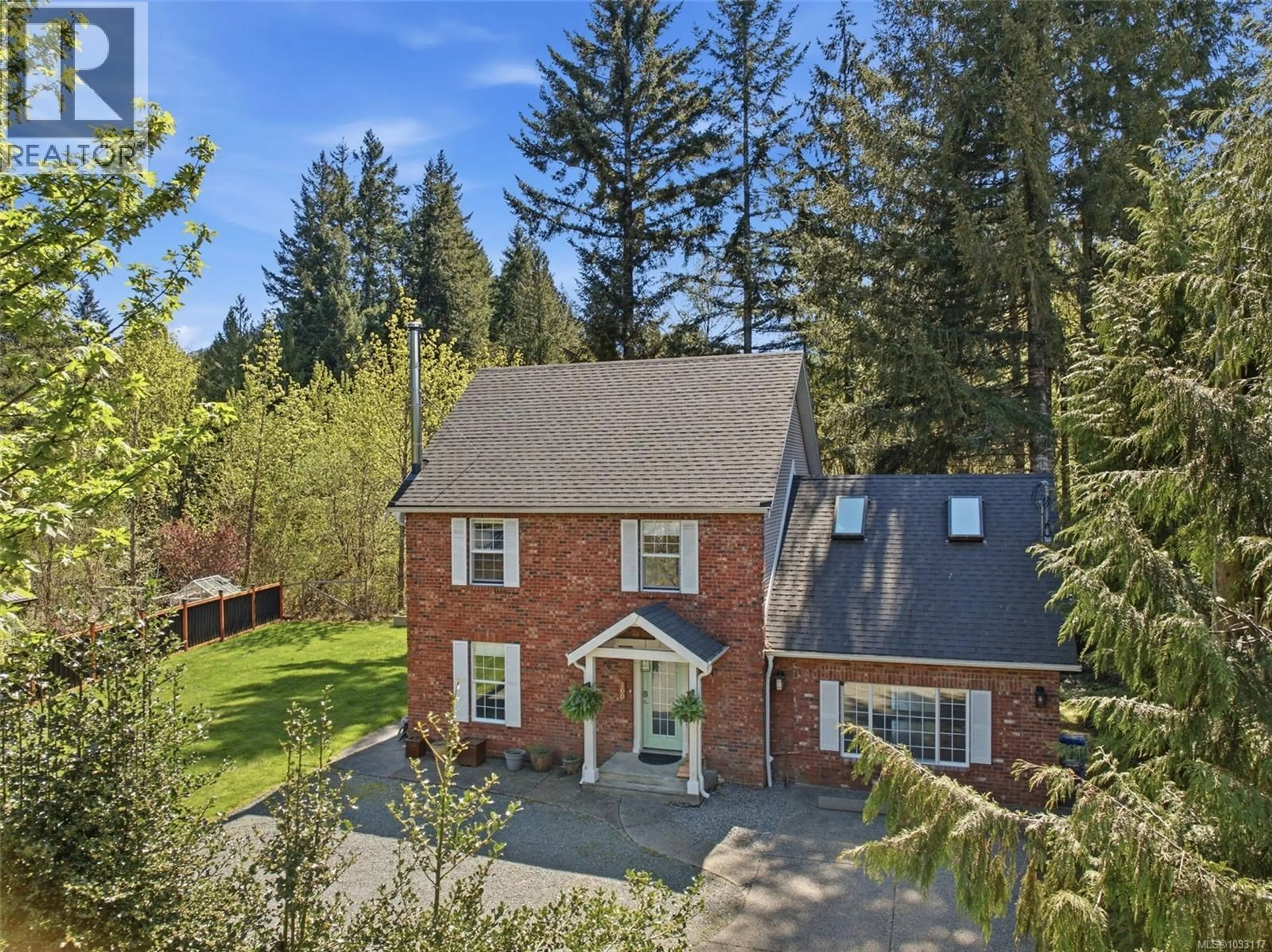 A pic from outside/outdoor area/front of a property/back of a property/a pic from drone, street for 100 COMIAKEN AVENUE, Lake Cowichan British Columbia V0R2G0