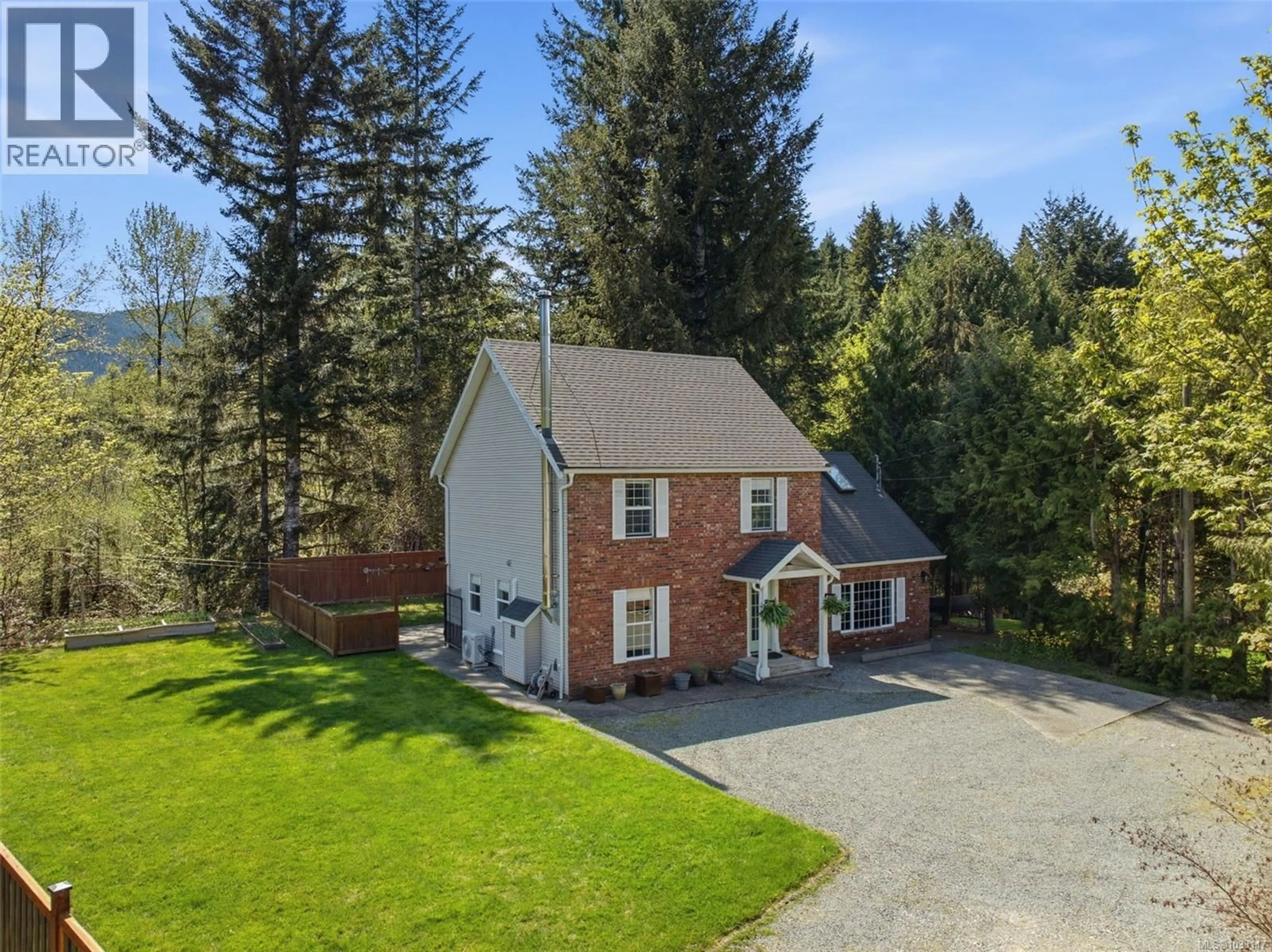 A pic from outside/outdoor area/front of a property/back of a property/a pic from drone, street for 100 COMIAKEN AVENUE, Lake Cowichan British Columbia V0R2G0