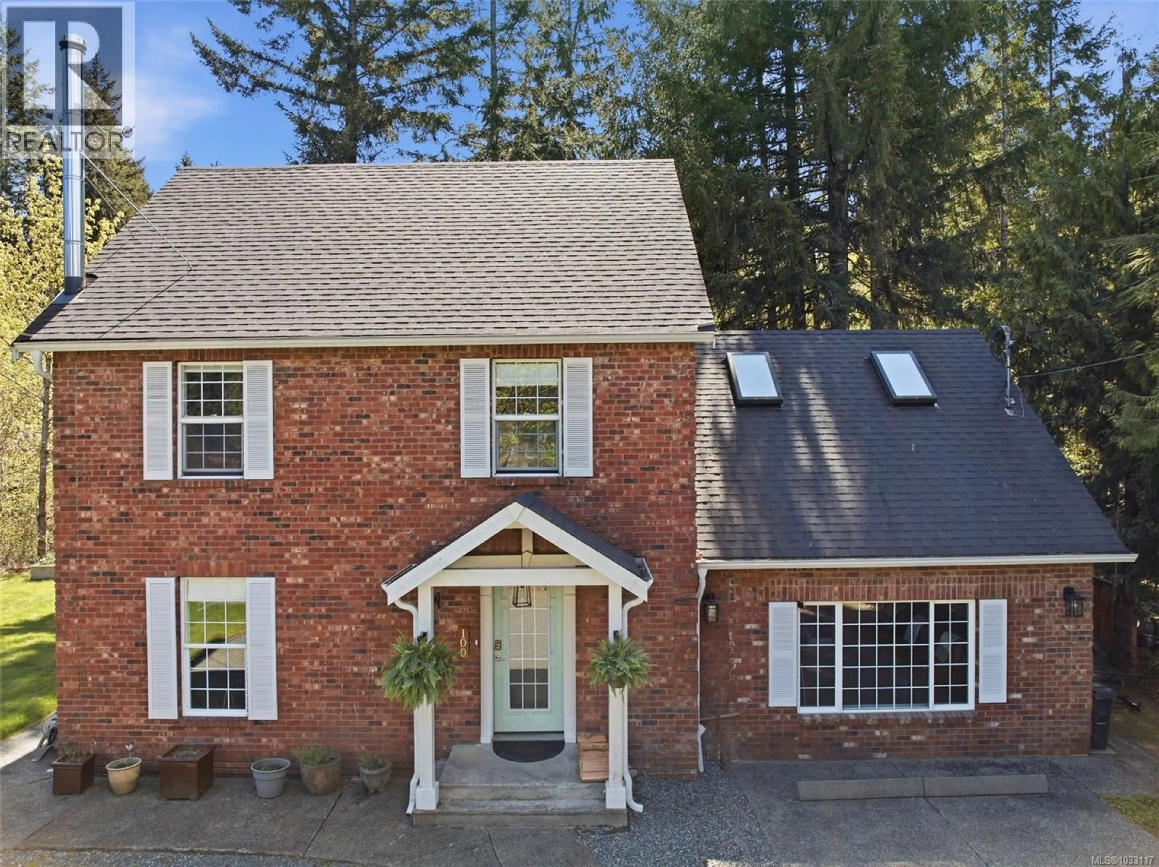 Home with brick exterior material, street for 100 COMIAKEN AVENUE, Lake Cowichan British Columbia V0R2G0