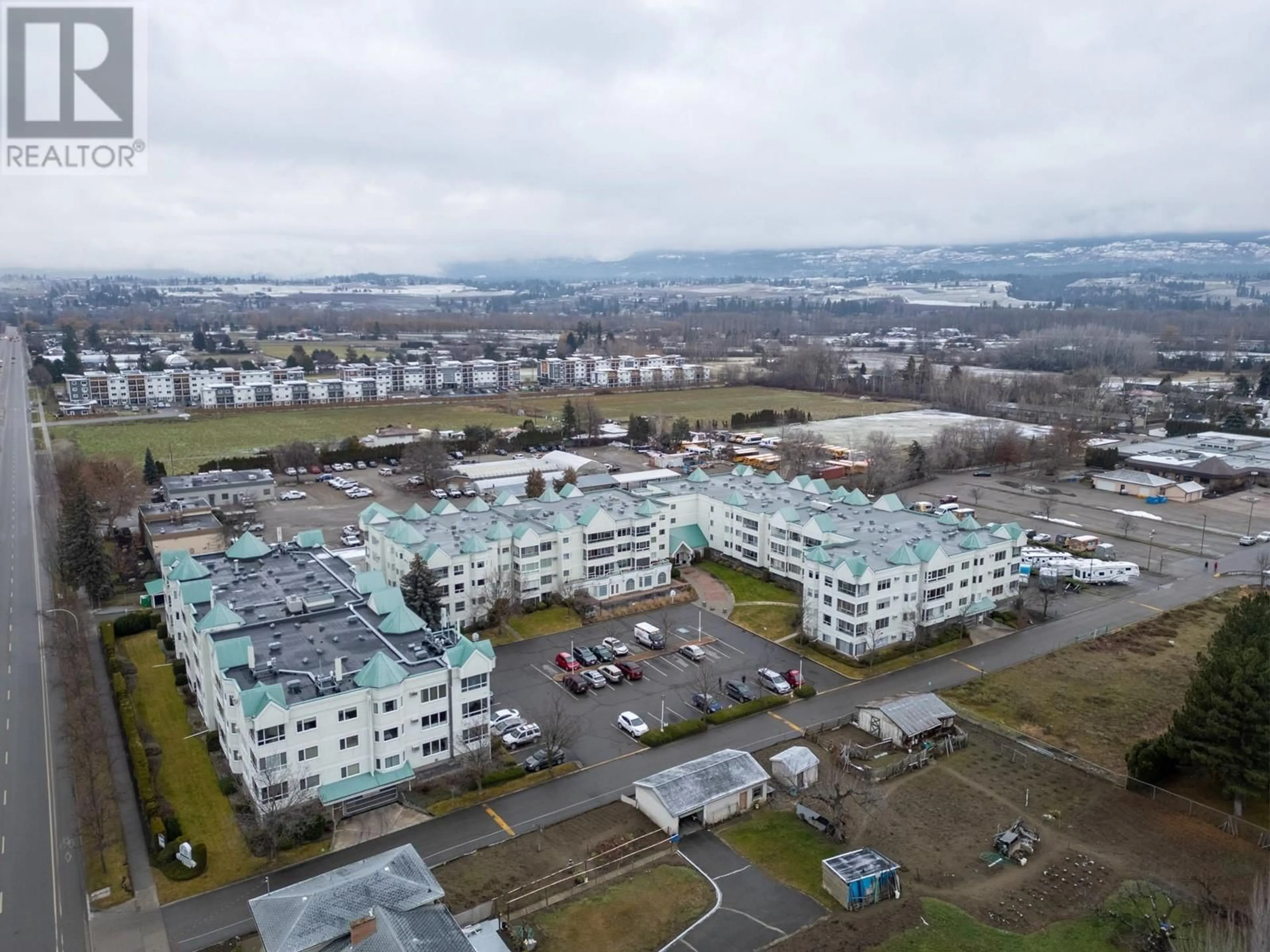 A pic from outside/outdoor area/front of a property/back of a property/a pic from drone, unknown for 1329 KLO Road Unit# 315, Kelowna British Columbia V1W3N9