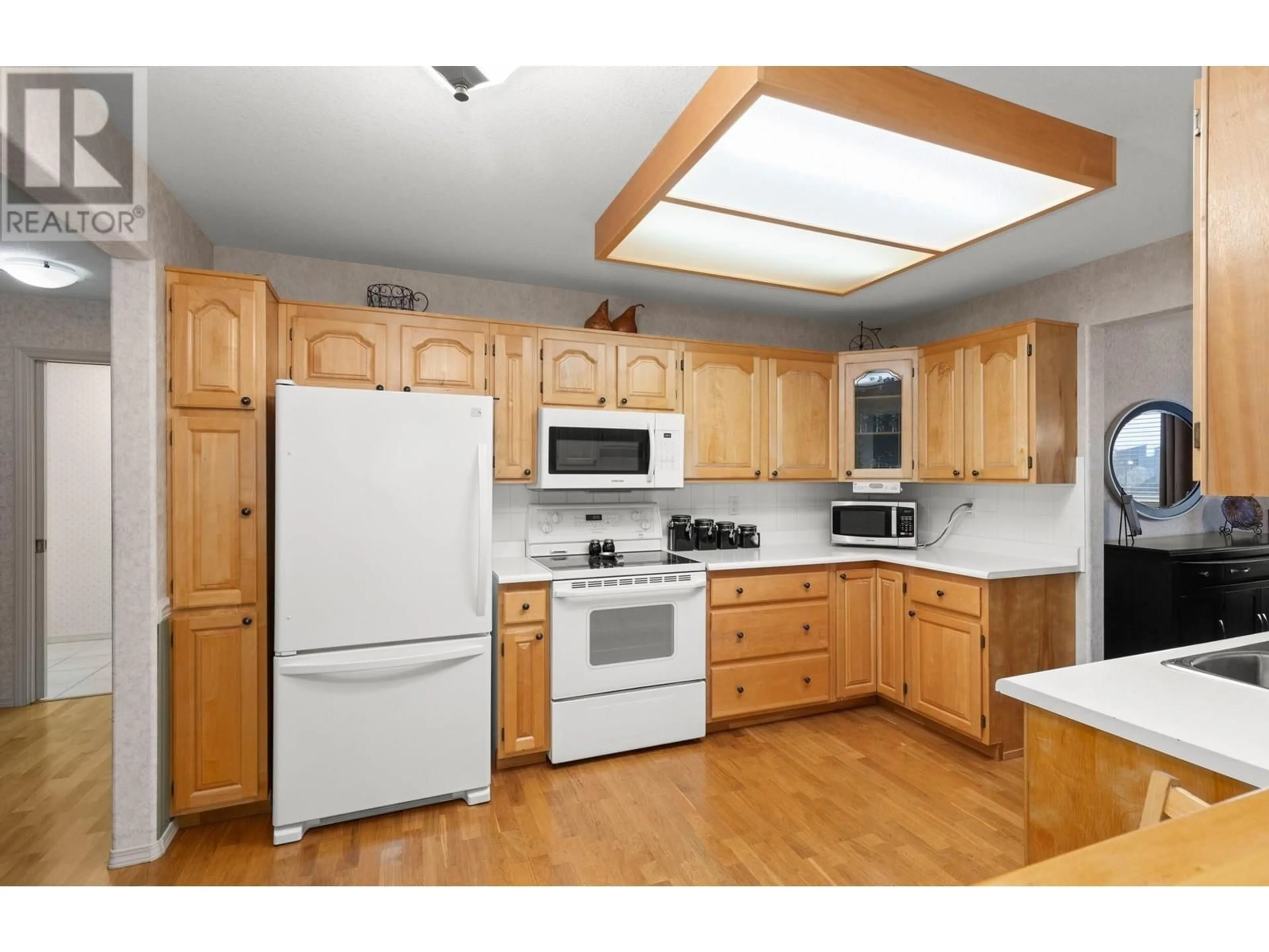 Standard kitchen, wood/laminate floor for 1329 KLO Road Unit# 315, Kelowna British Columbia V1W3N9