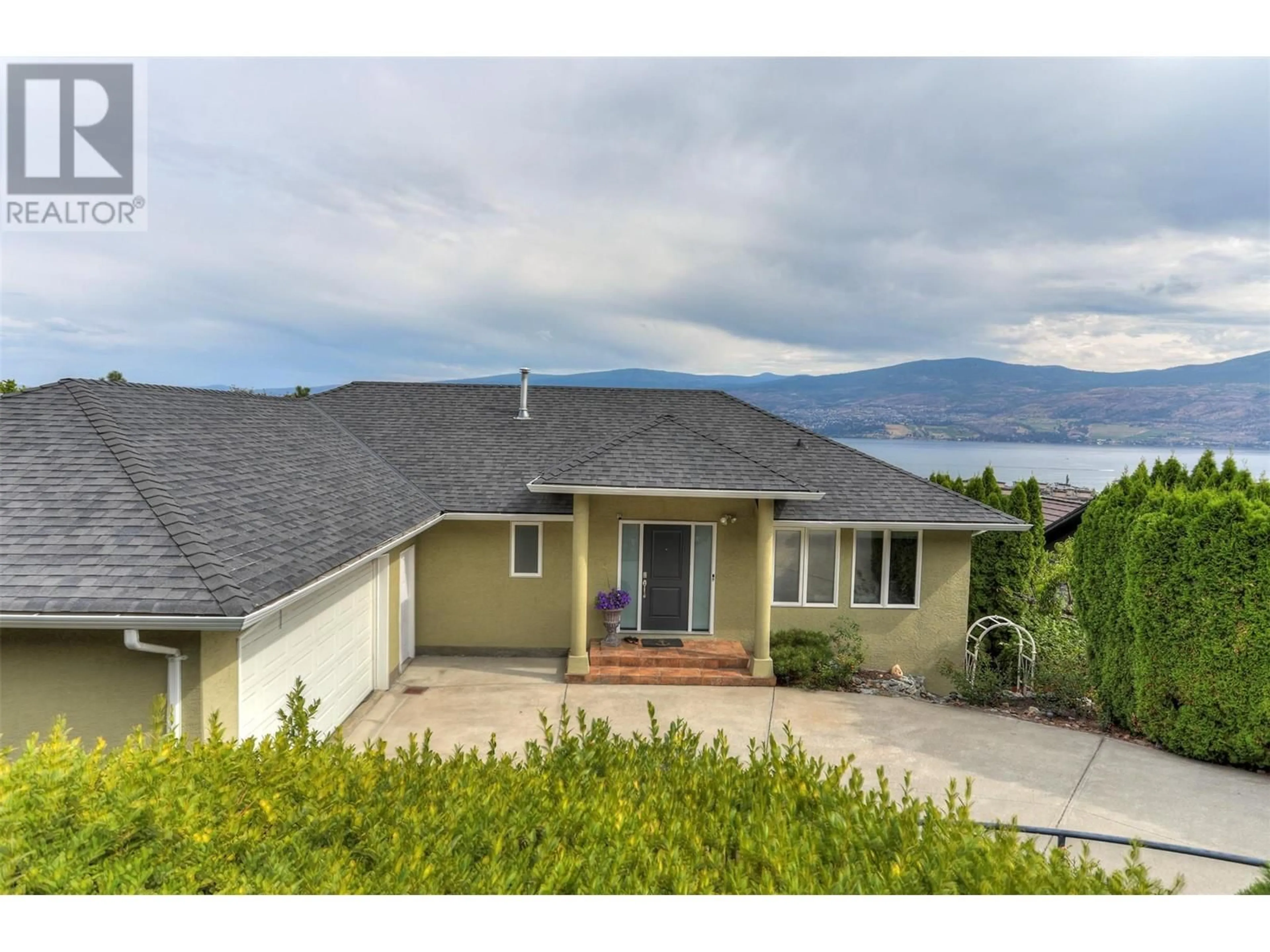 A pic from outside/outdoor area/front of a property/back of a property/a pic from drone, water/lake/river/ocean view for 3582 Apple Way Boulevard, West Kelowna British Columbia V4T1Y7