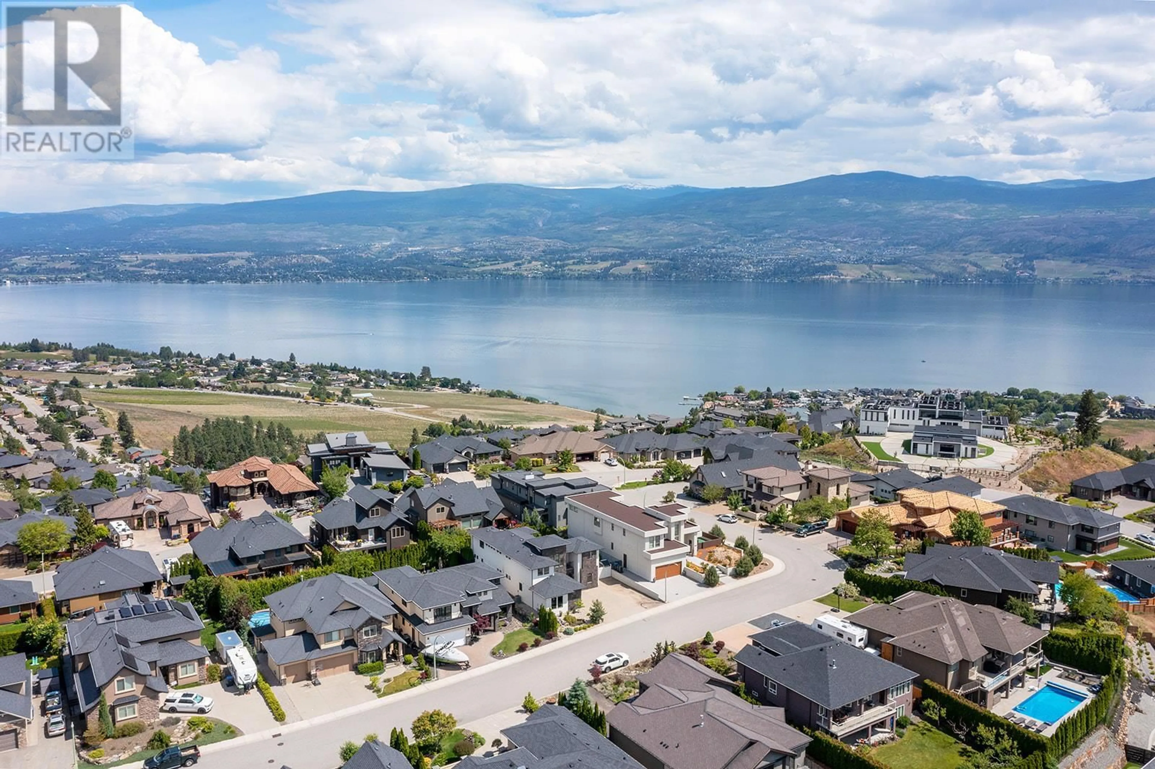 A pic from outside/outdoor area/front of a property/back of a property/a pic from drone, water/lake/river/ocean view for 3237 Malbec Crescent, West Kelowna British Columbia V4T3B5