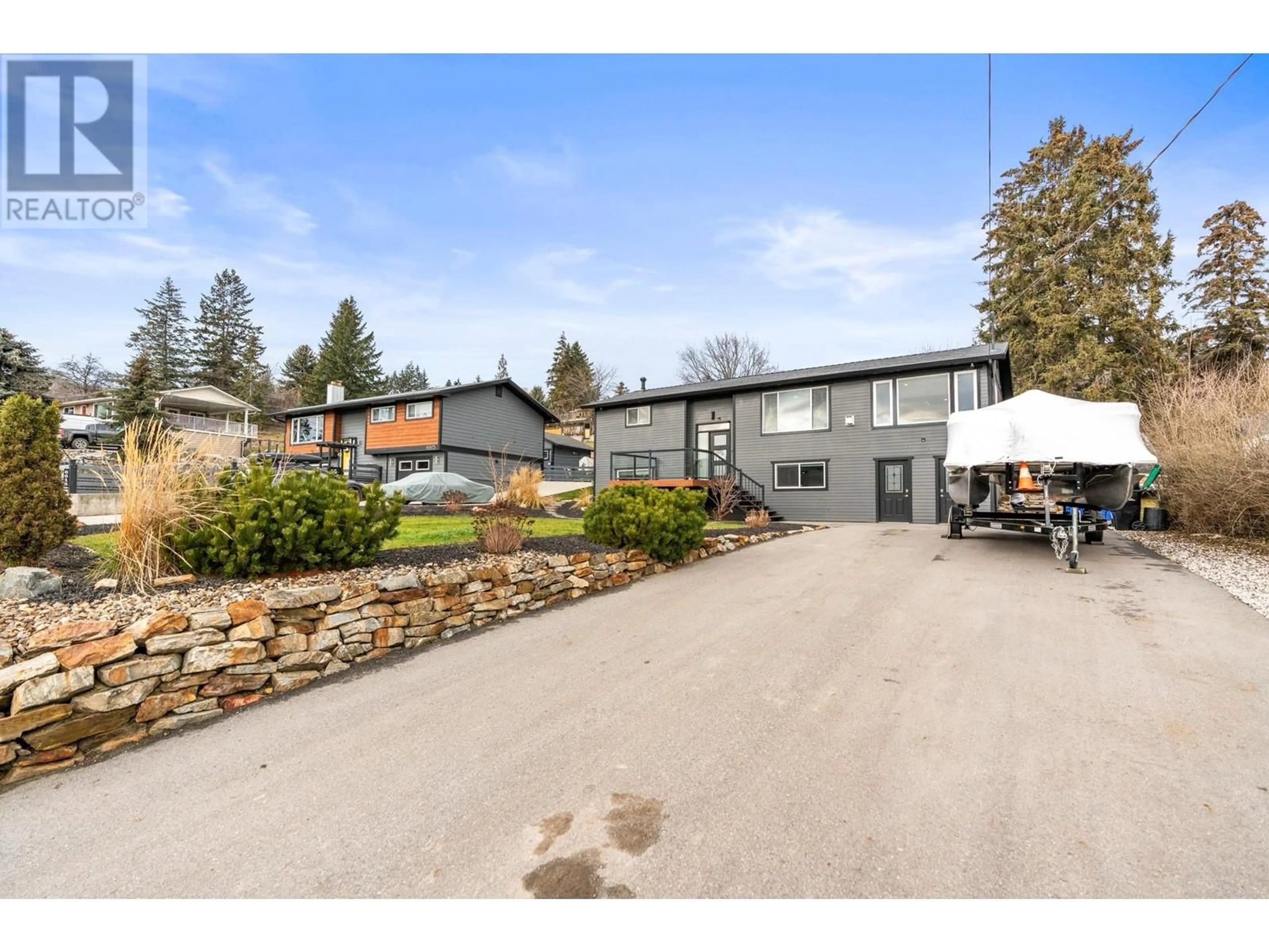 A pic from outside/outdoor area/front of a property/back of a property/a pic from drone, unknown for 6611 Cameo Drive, Vernon British Columbia V1H1N6