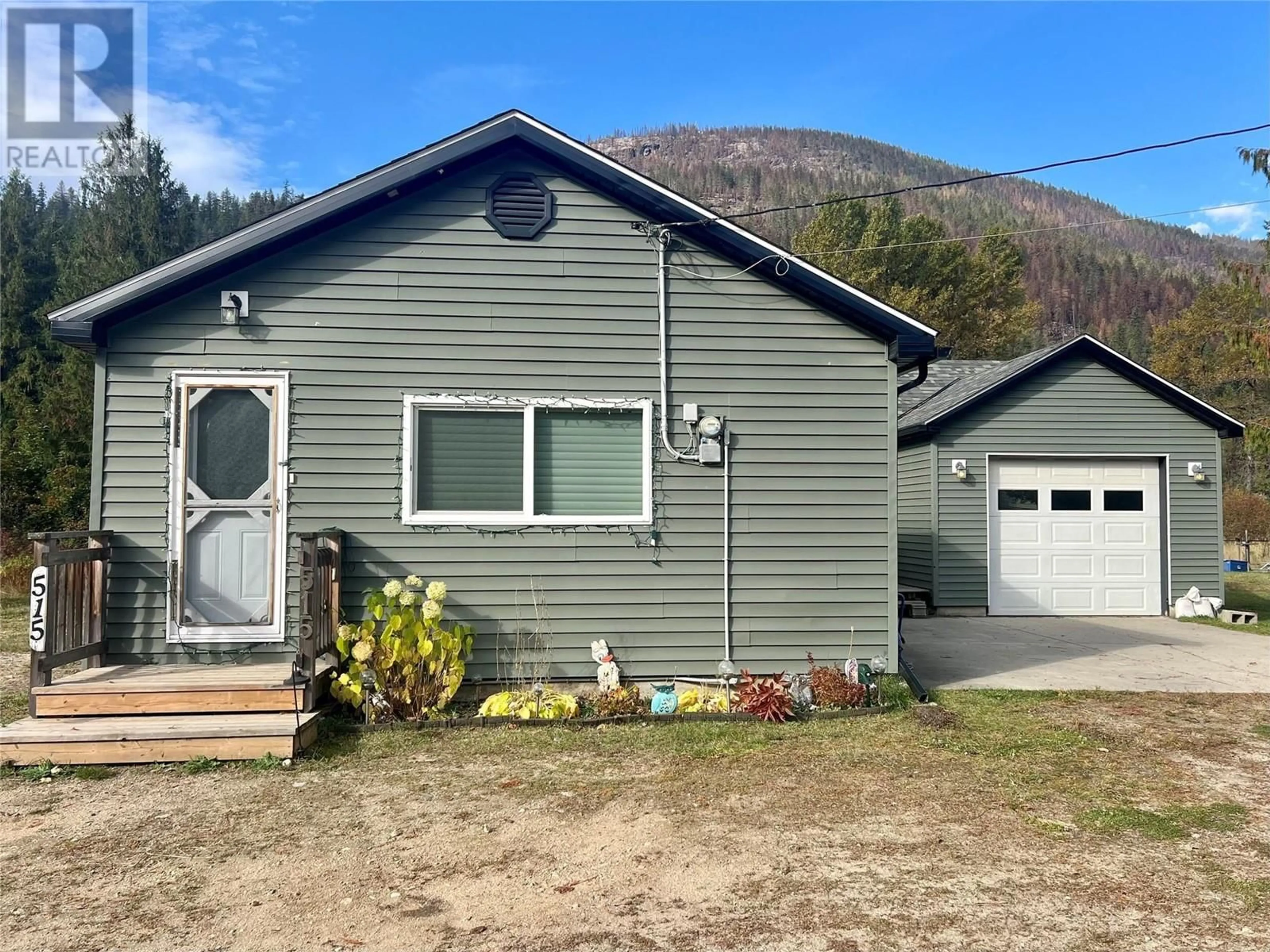 Home with vinyl exterior material, mountain view for 515 MAIN STREET, Slocan British Columbia V0G2C0