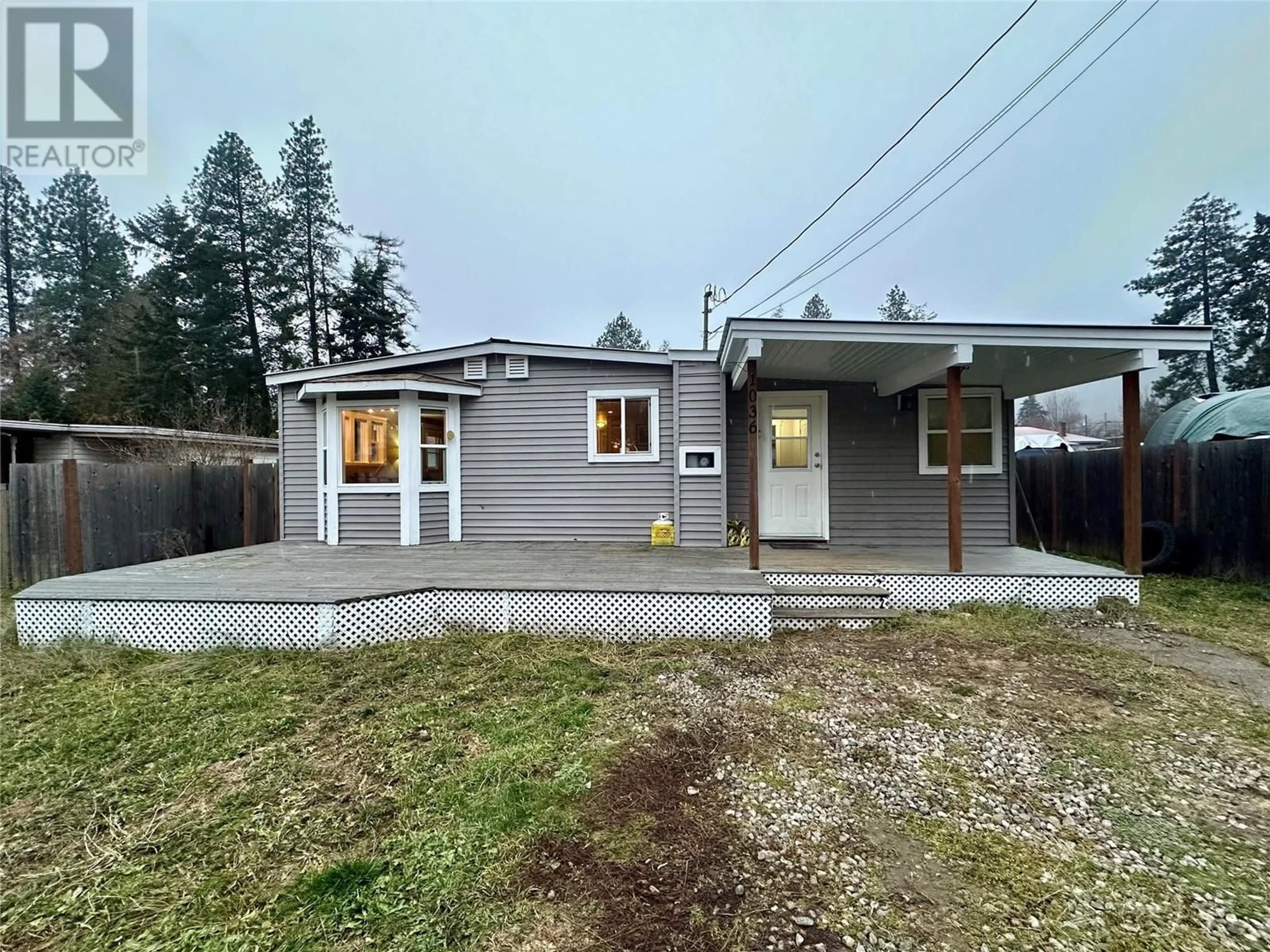 Home with vinyl exterior material, street for 1036 Frances Street, Castlegar British Columbia V0G1X0